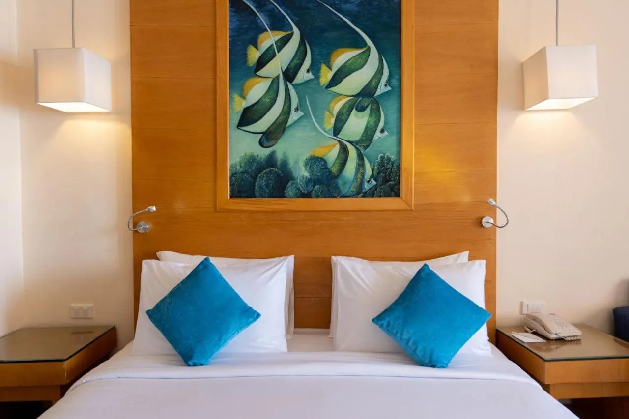 Bed in Parrotel Beach Resorts