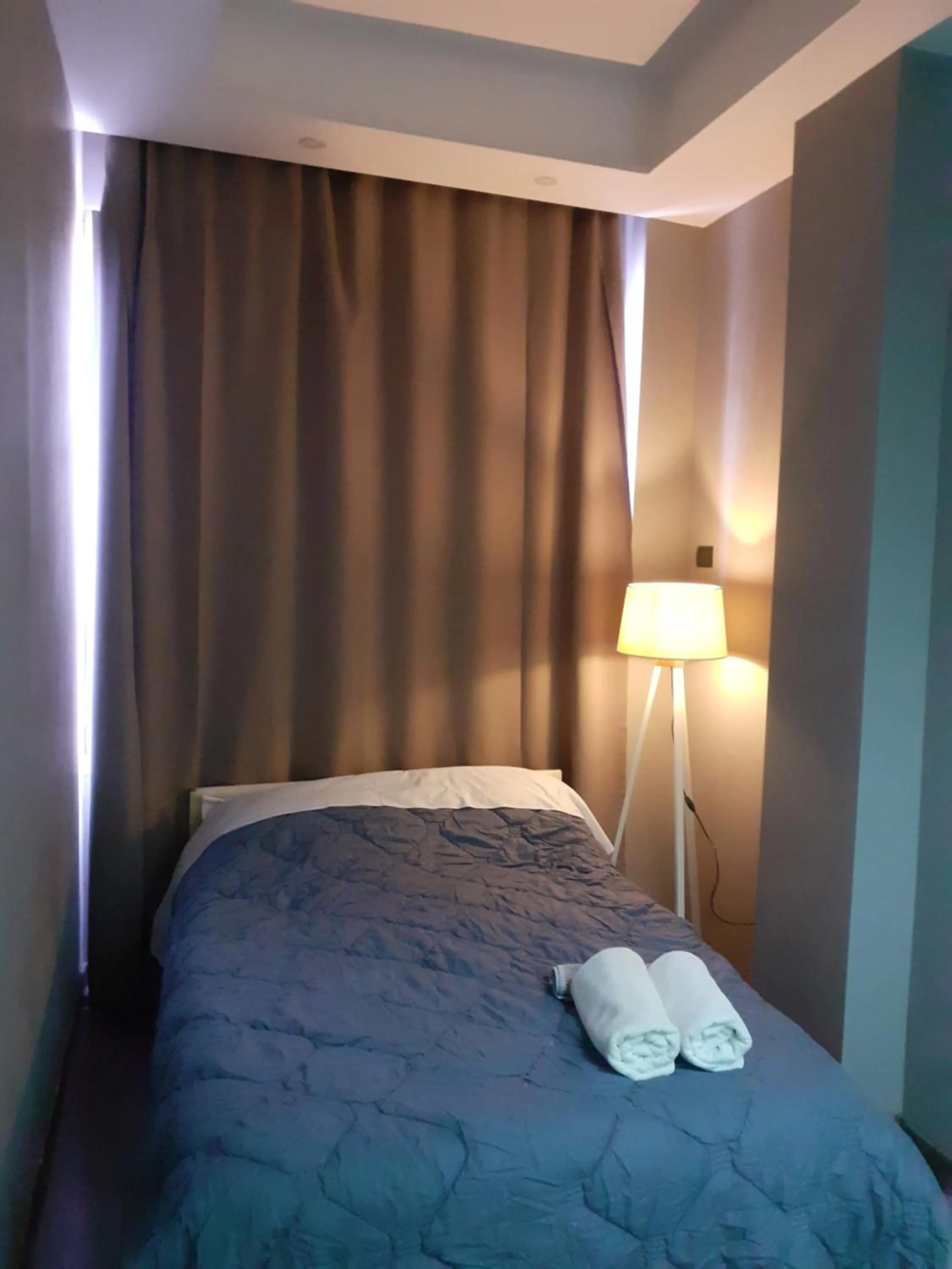 Bed in Driti Central Hotel