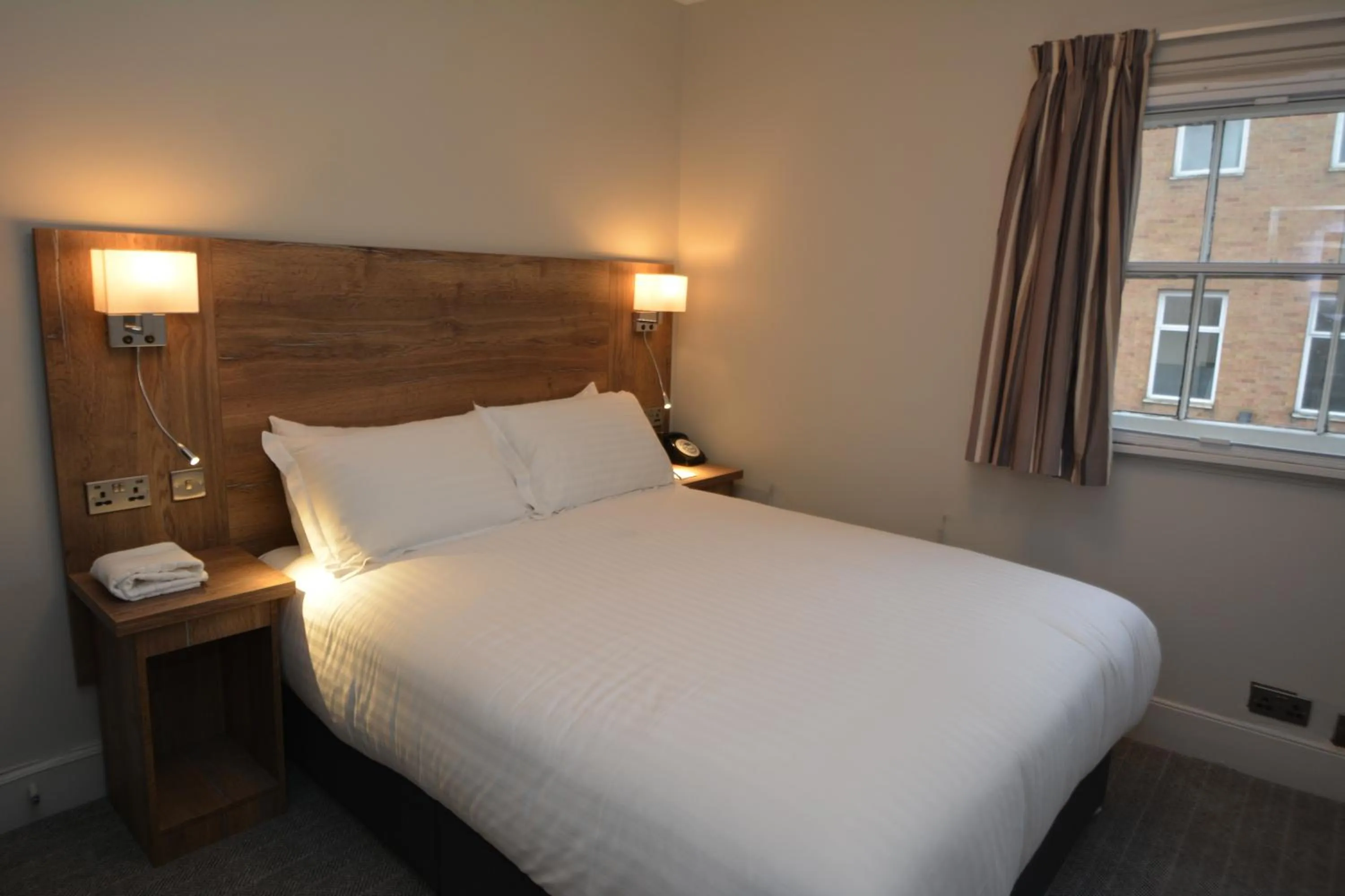 Bed in The Rugby Hotel