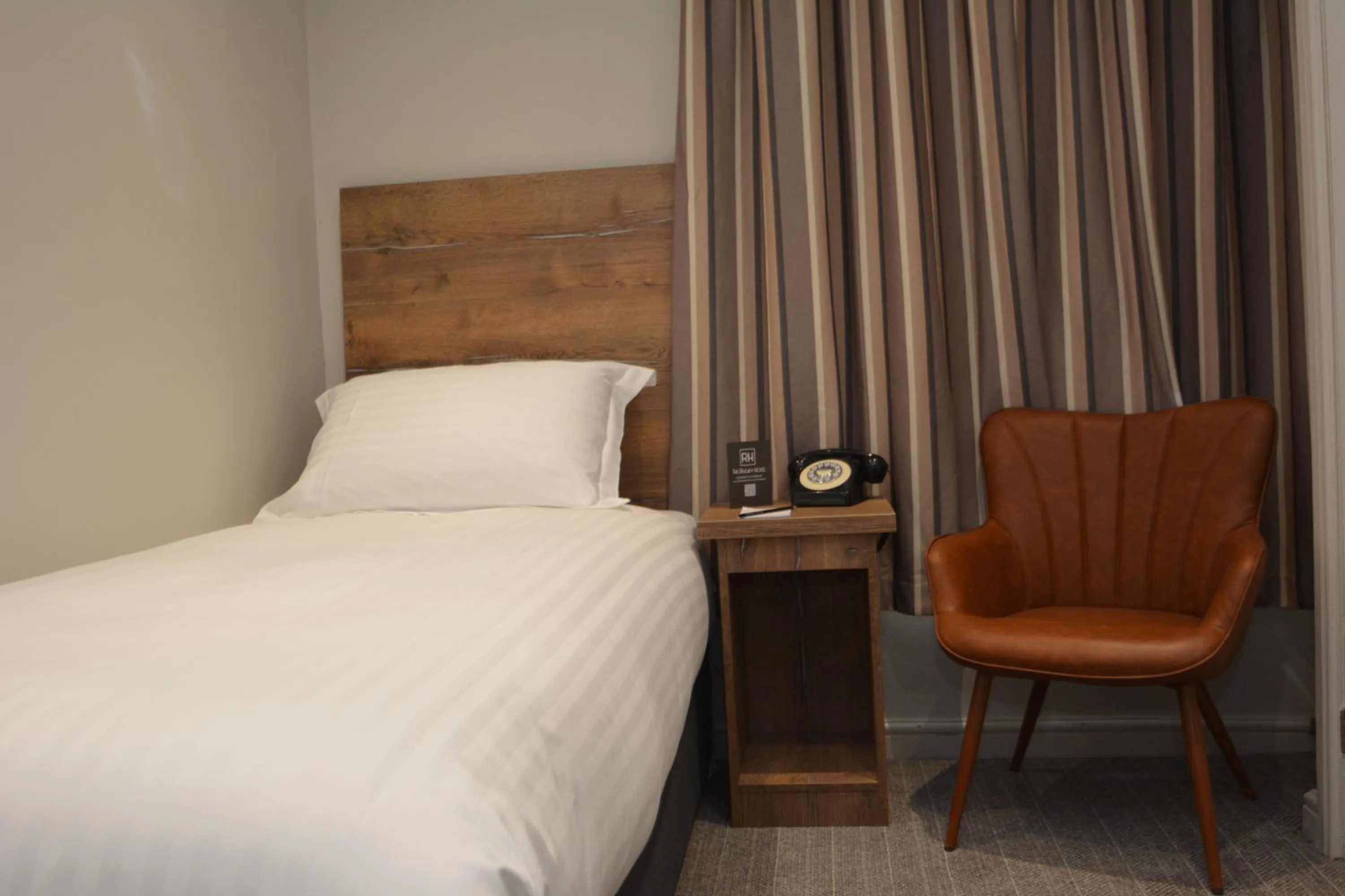 Bed in The Rugby Hotel