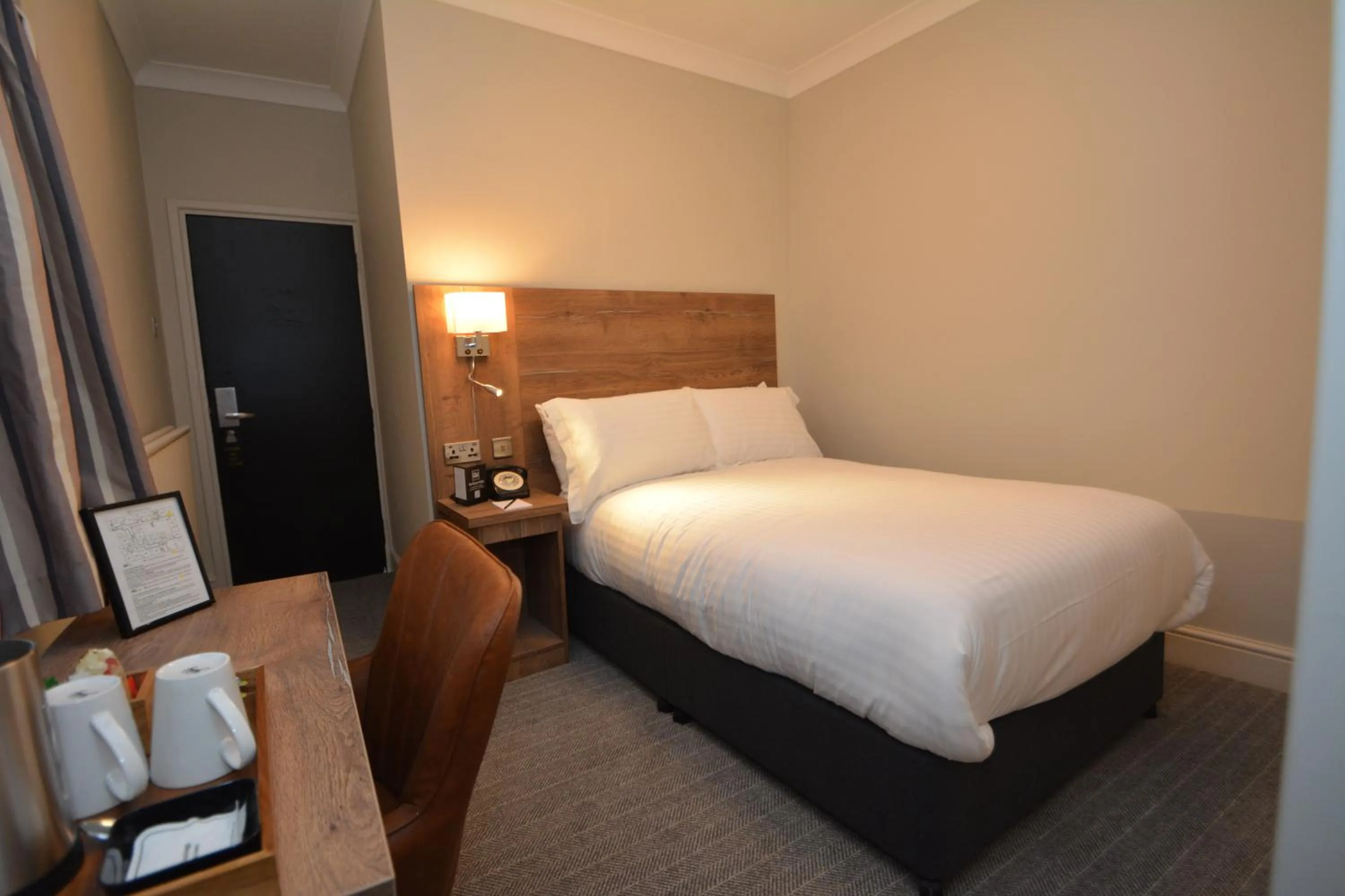 Bed in The Rugby Hotel