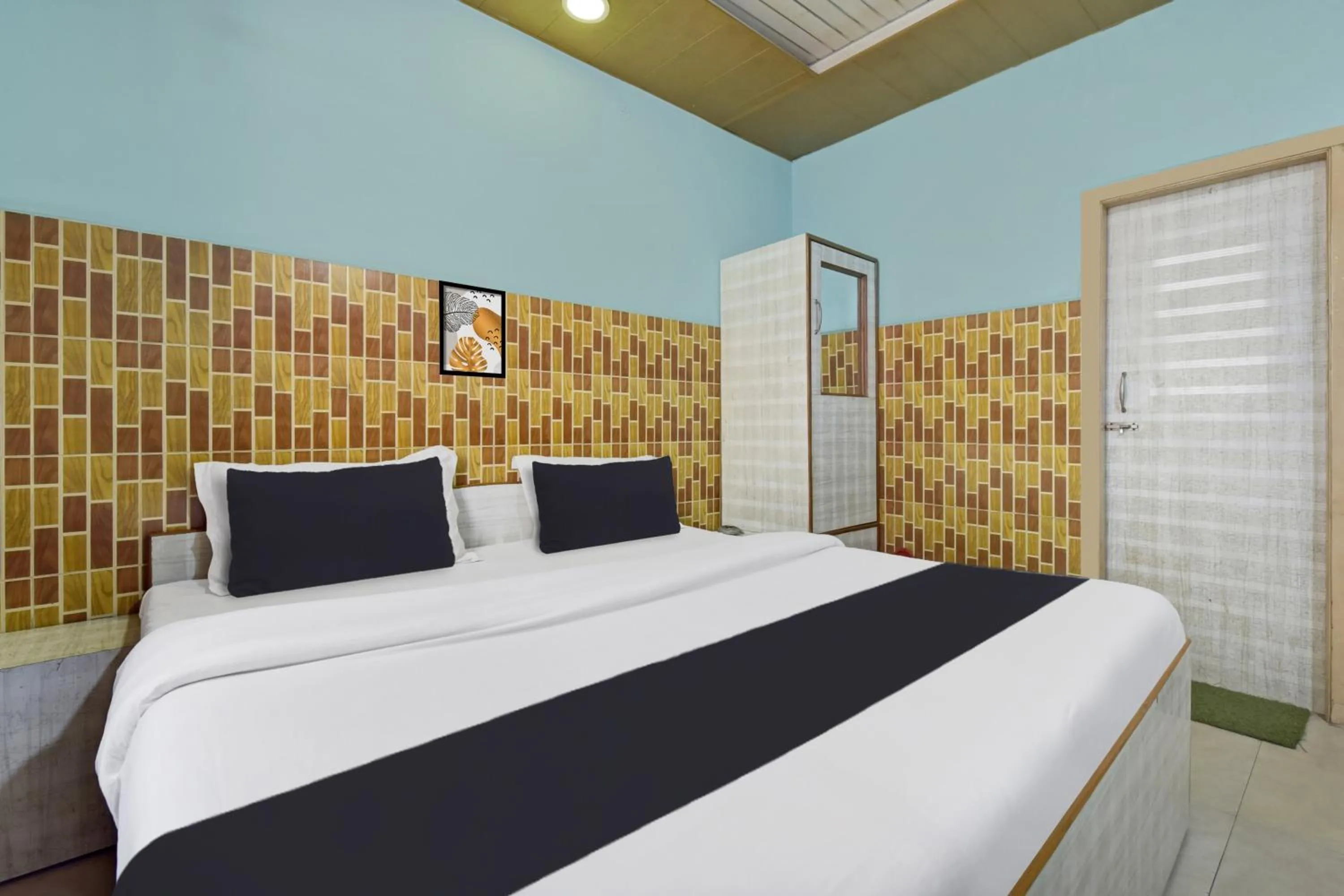 Bedroom in Hotel O Indira