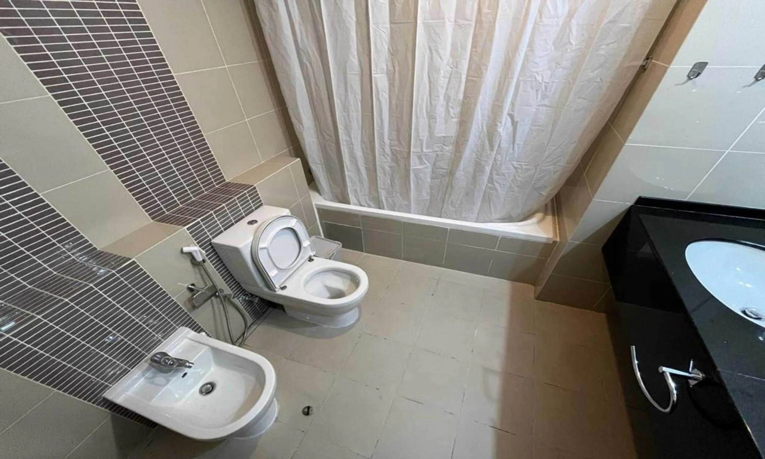 Bathroom in City View Furnished Apartment in Palette Tower in Tourist Club Area