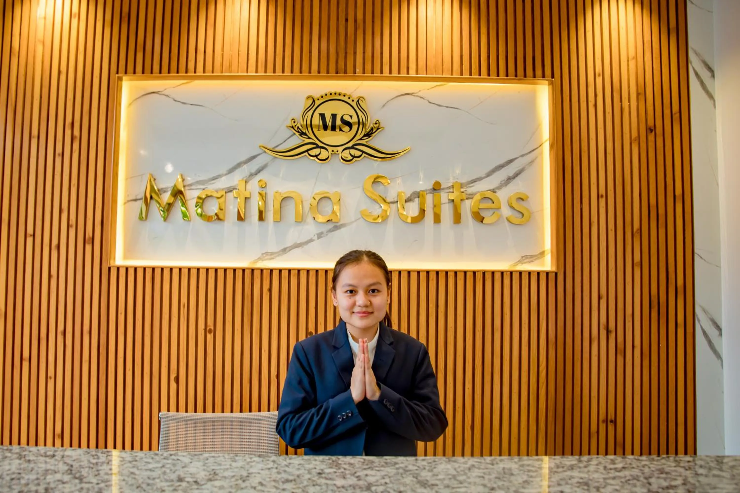 Property logo or sign in Hotel Matina Suites