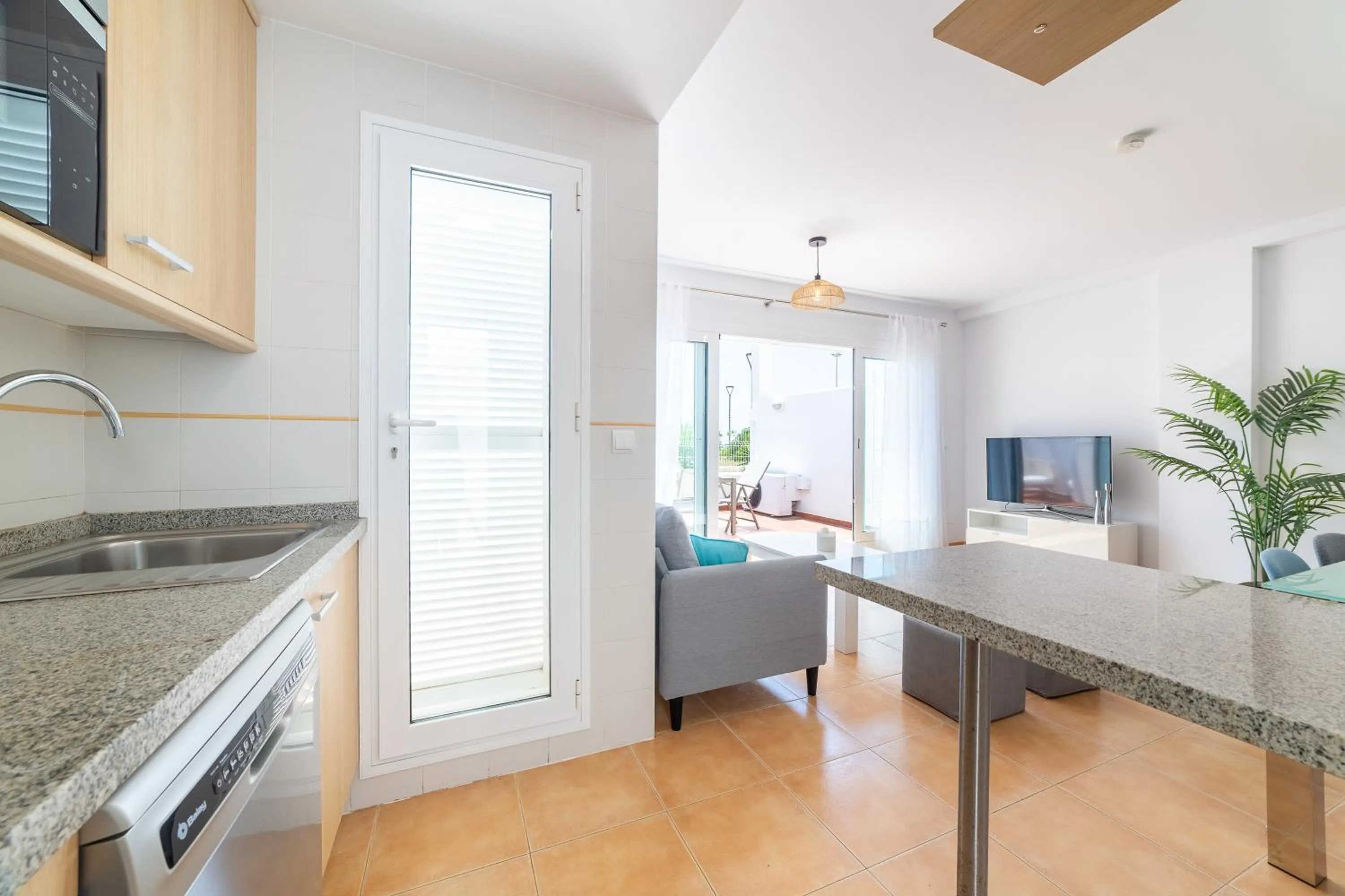 Kitchen or kitchenette in AlmeriaSuite Mojacar Breeze Apartments