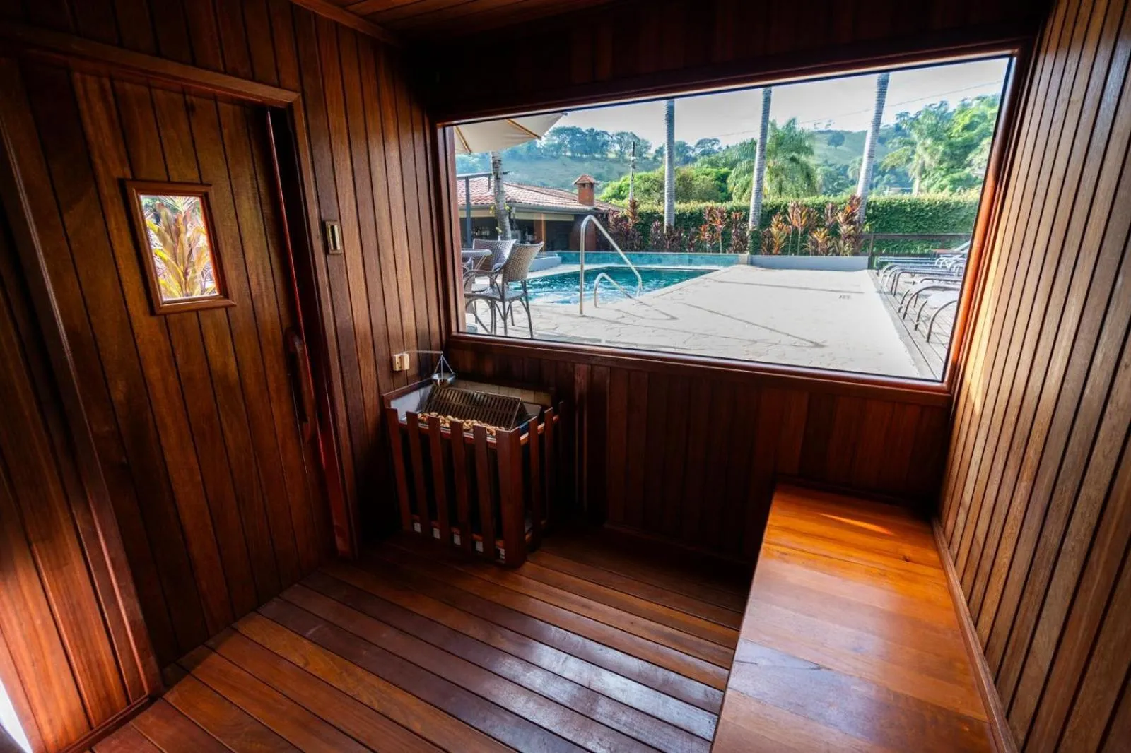 Swimming pool in Vale das Orquídeas Pousada