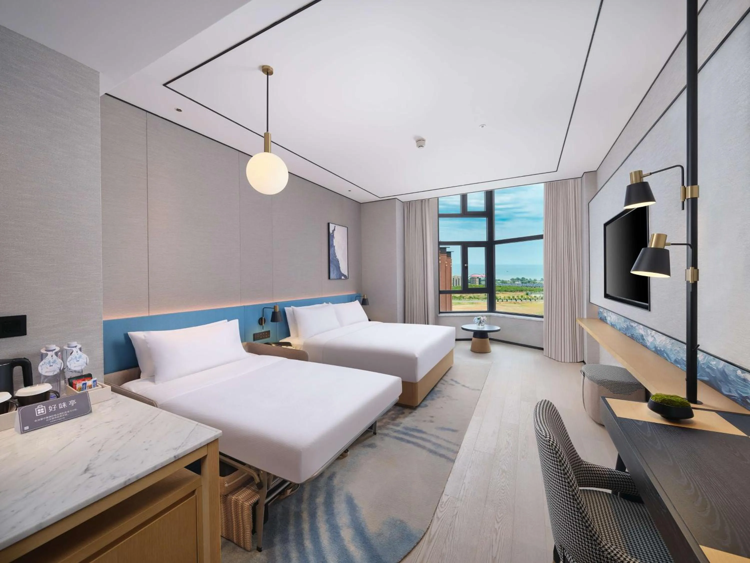 Living room, Bed in Hilton Garden Inn Huludao Longxing Road