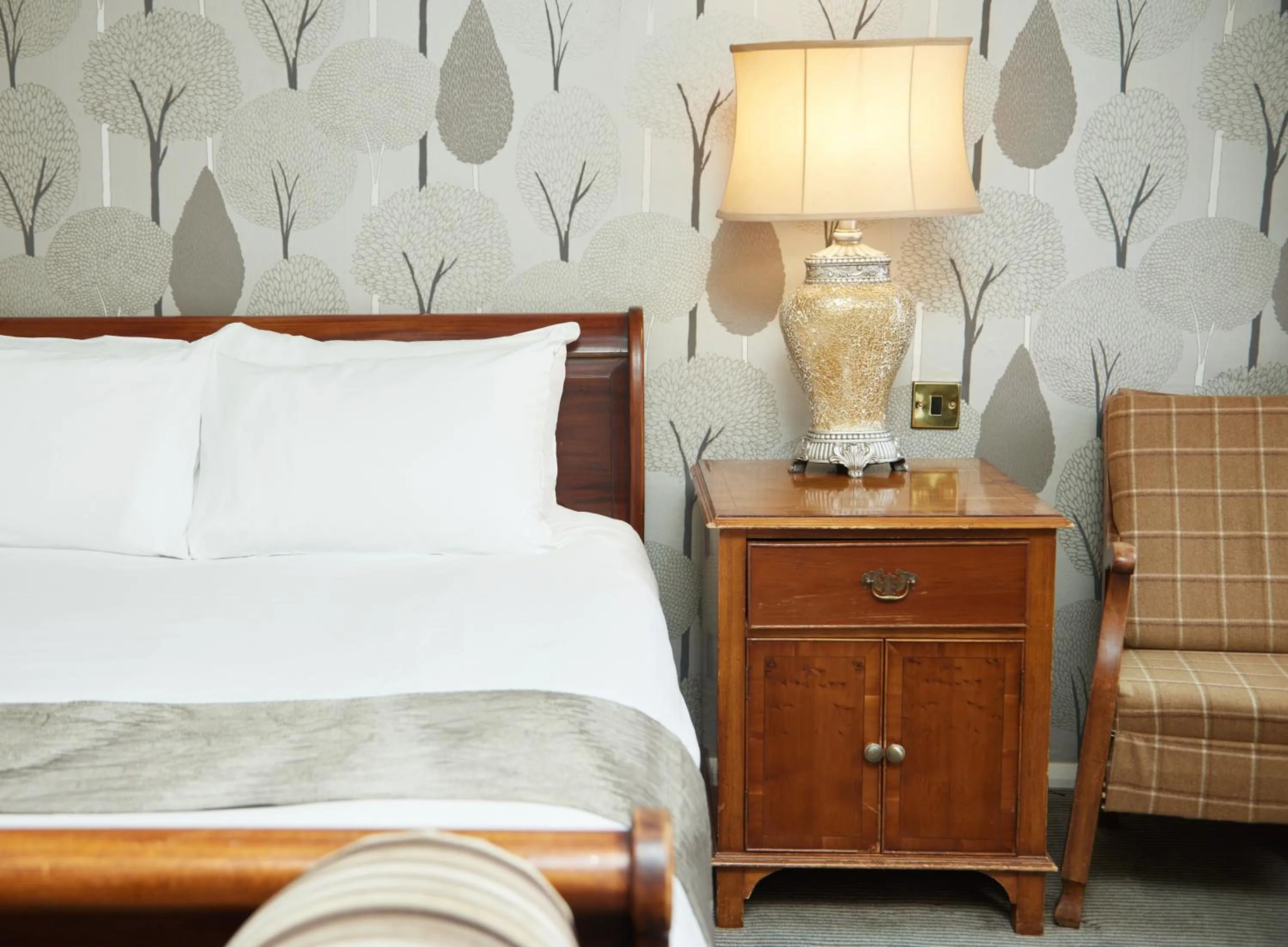 Bed in Cock Hotel by Greene King Inns