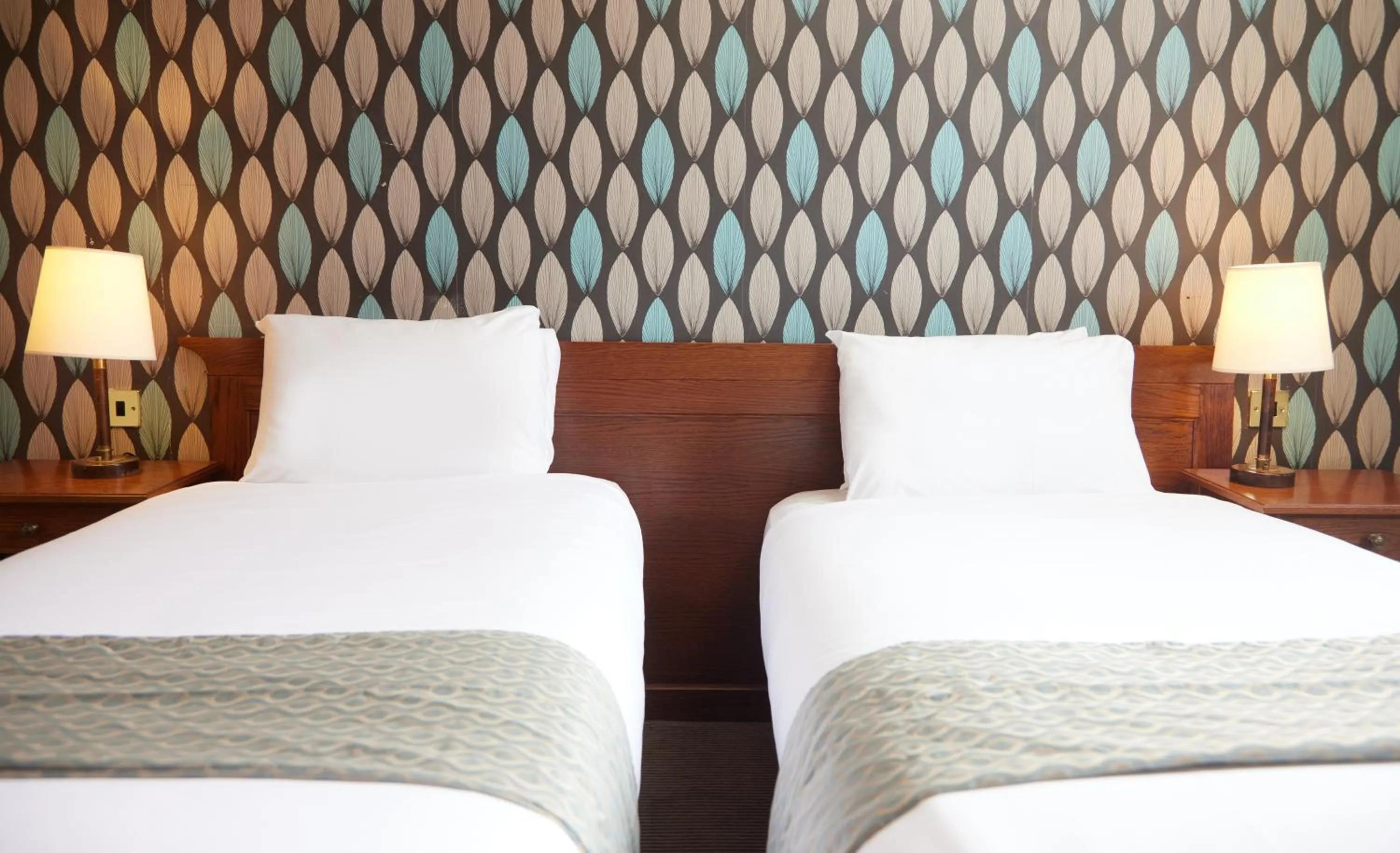 Bed in Cock Hotel by Greene King Inns