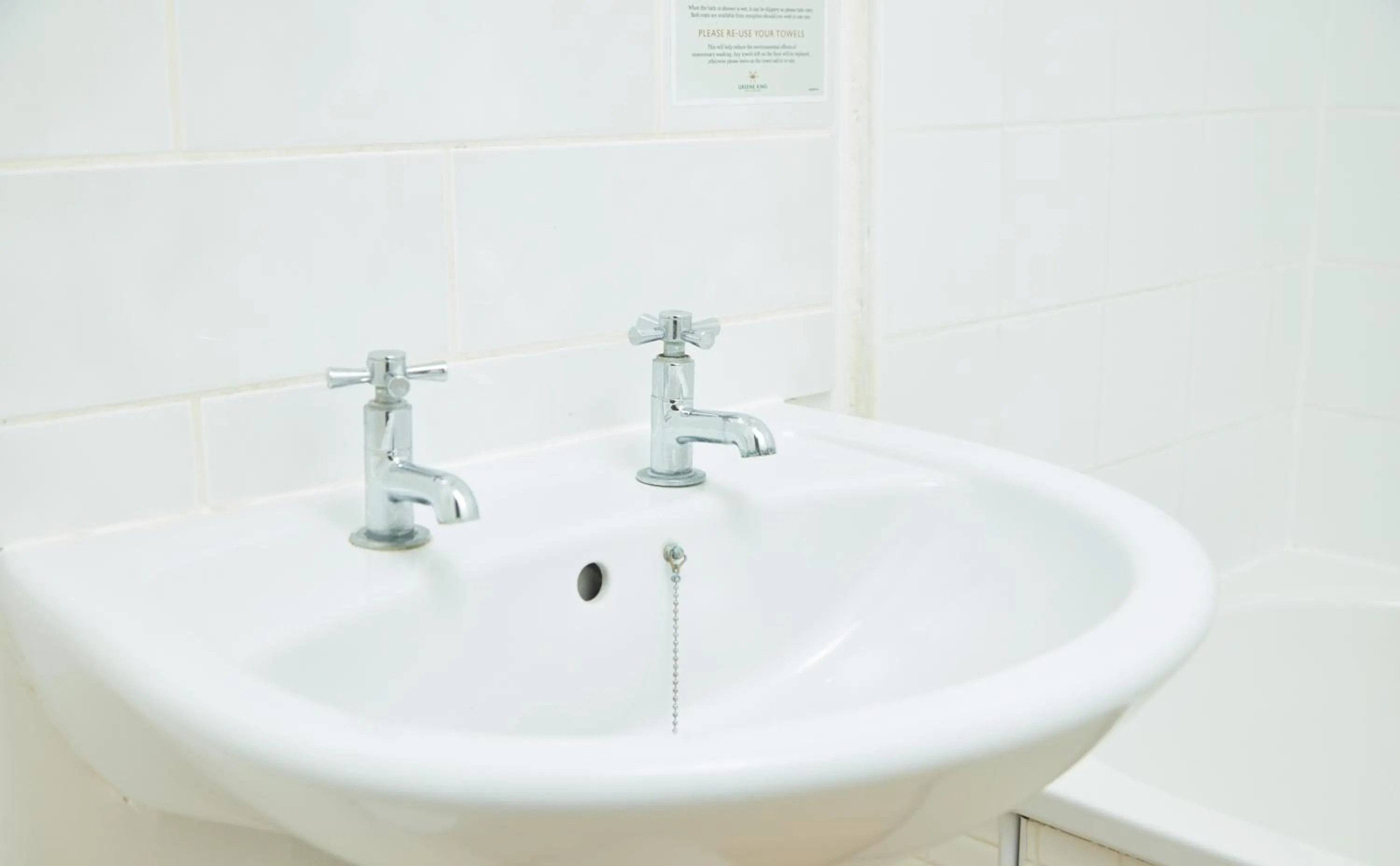 Bathroom in Cock Hotel by Greene King Inns