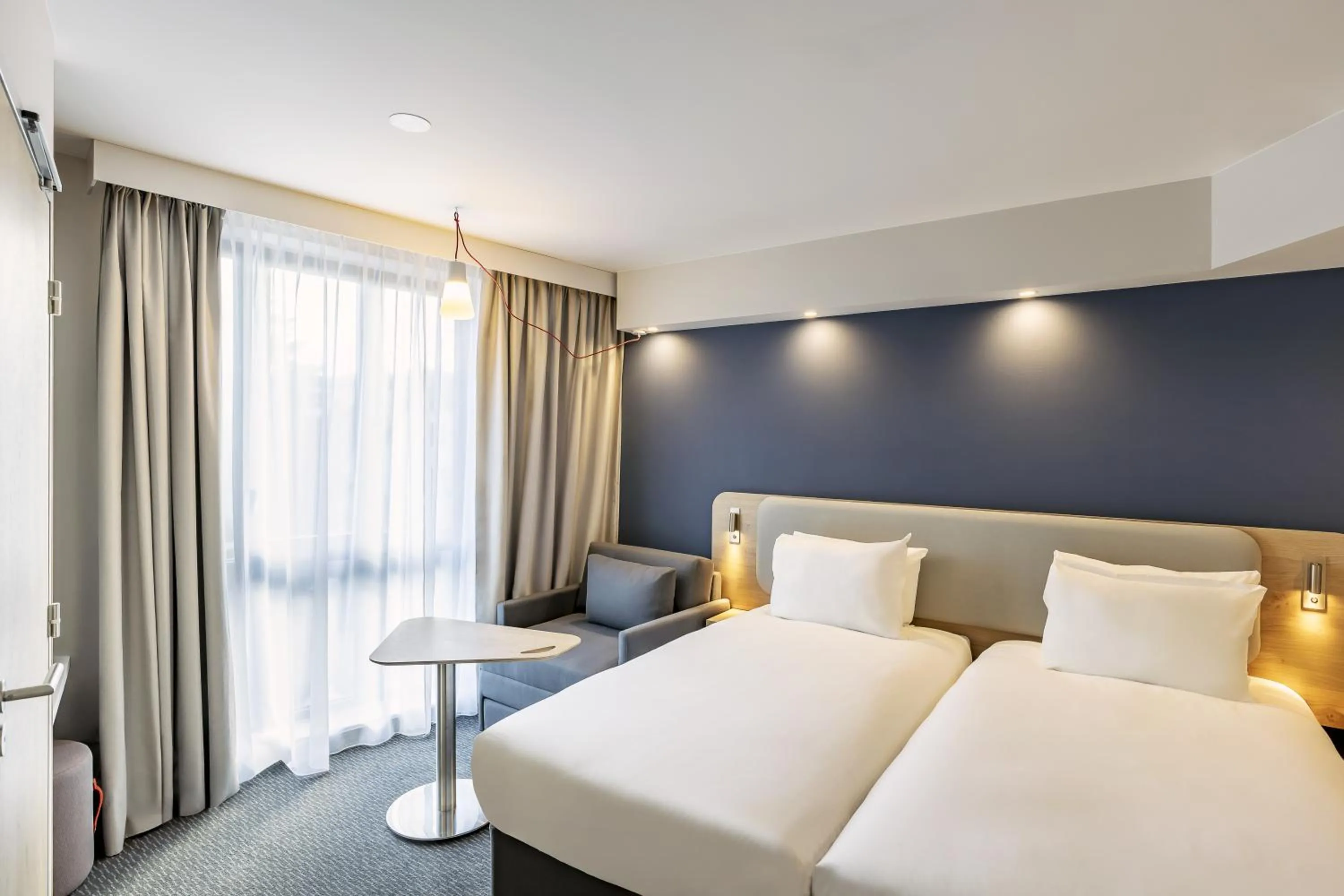 Bedroom, Bed in Holiday Inn Express Paris - Poissy by IHG
