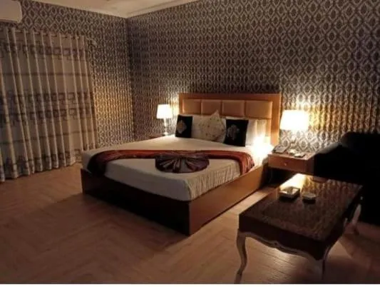 Bed in AK Hotel Of Guest House