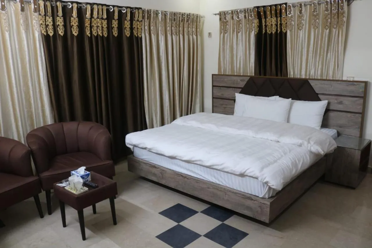 Bed in AK Hotel Of Guest House