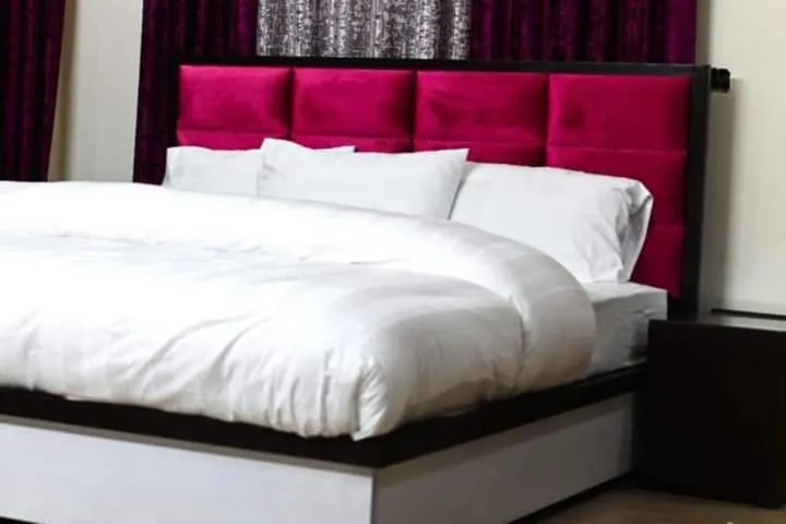 Bed in AK Hotel Of Guest House