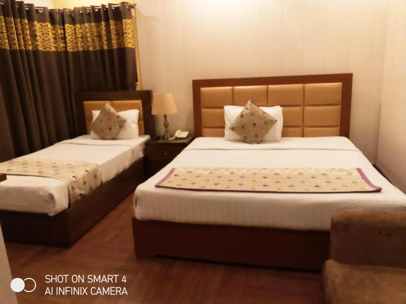 Bed in AK Hotel Of Guest House
