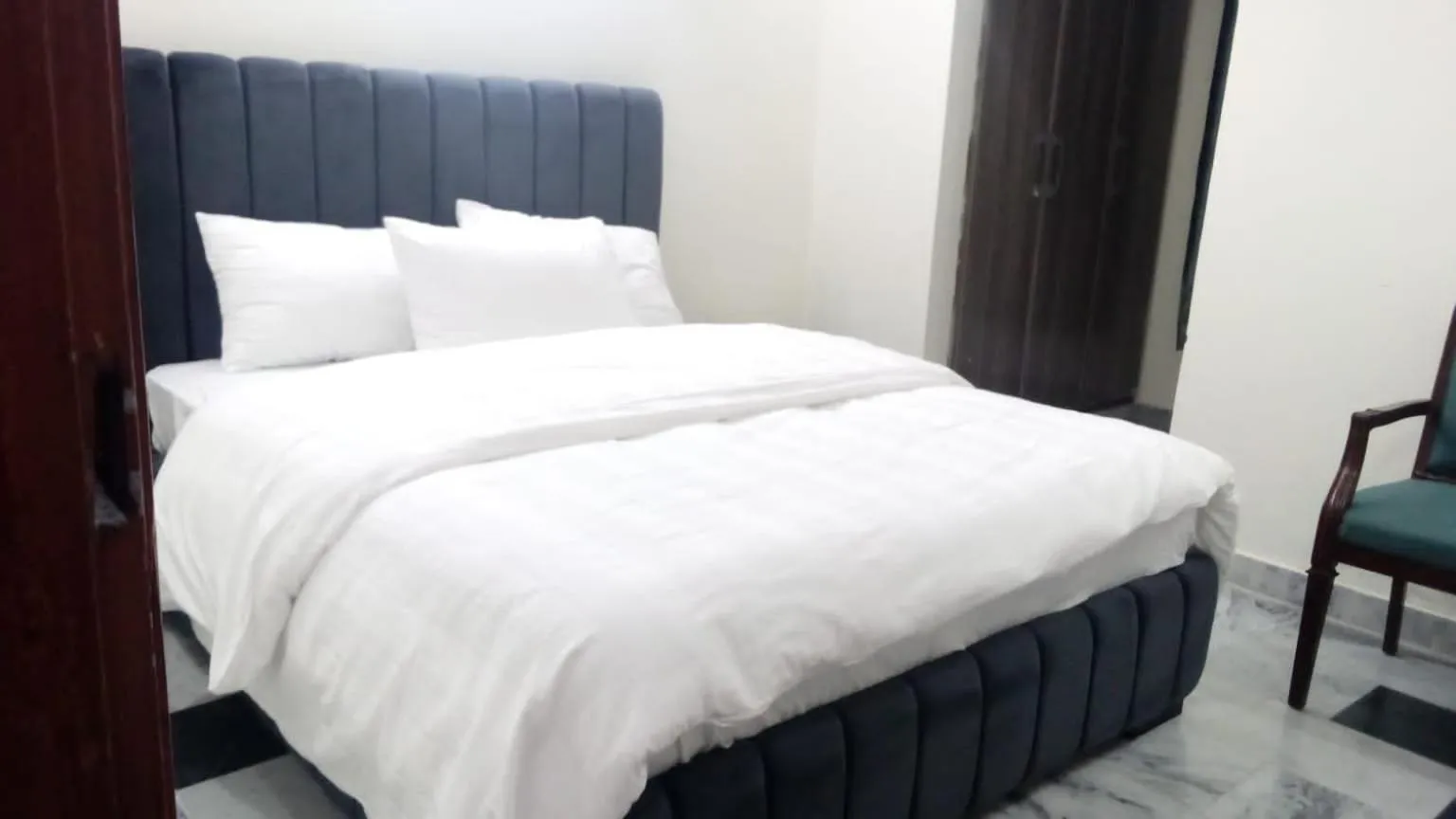 Bed in AK Hotel Of Guest House