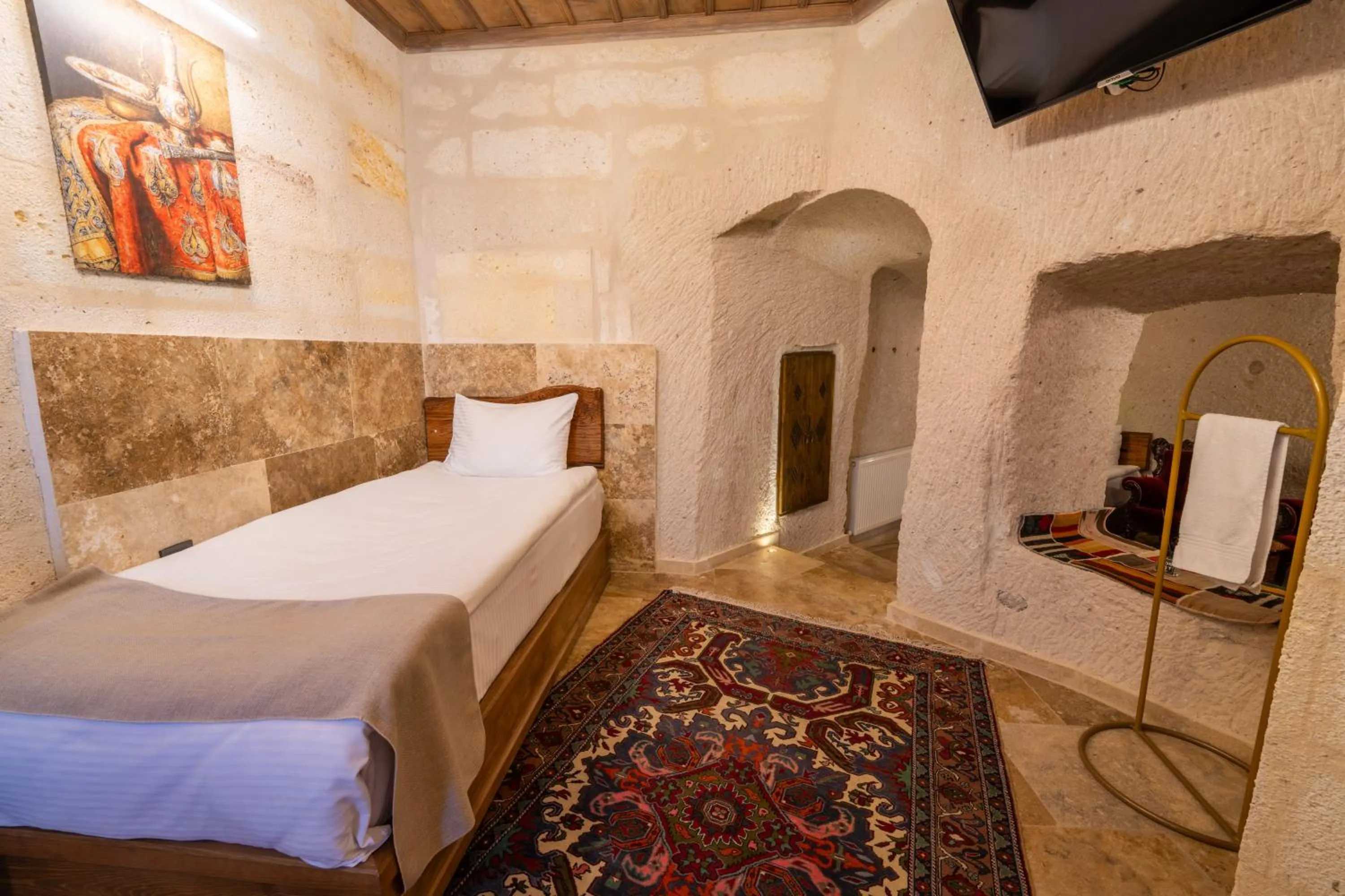 Bed in Library Cave House