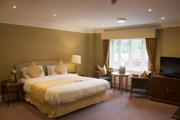 Bed in Grovefield House Hotel By Uno