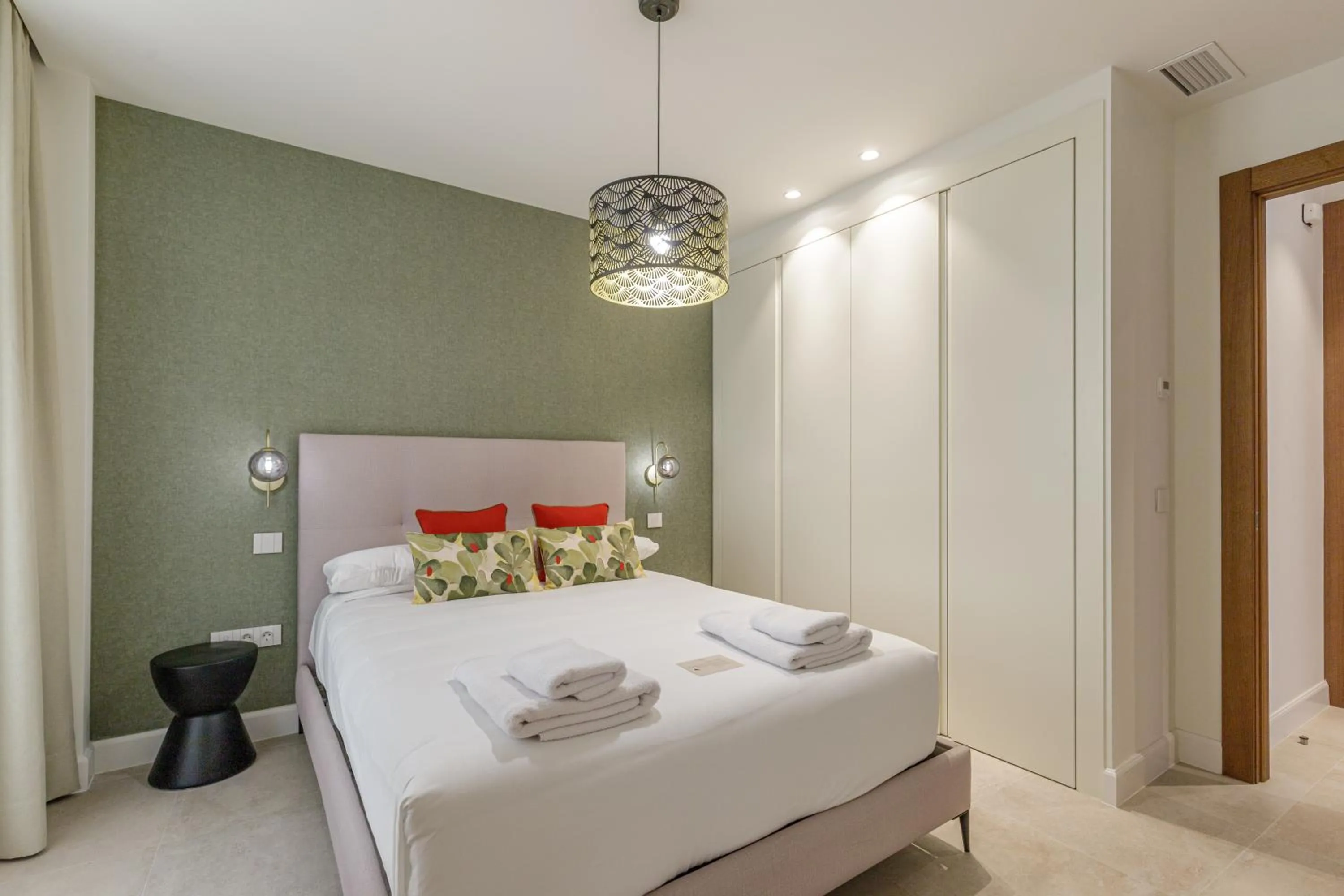 Bed in Plaza del Siglo Suites & Boutique Apartments by Caleta Homes