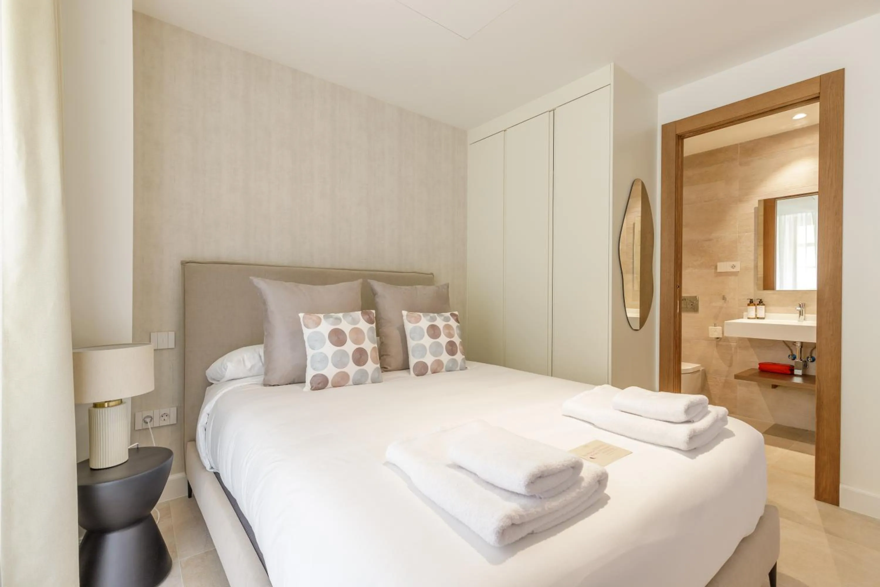 Bed in Plaza del Siglo Suites & Boutique Apartments by Caleta Homes