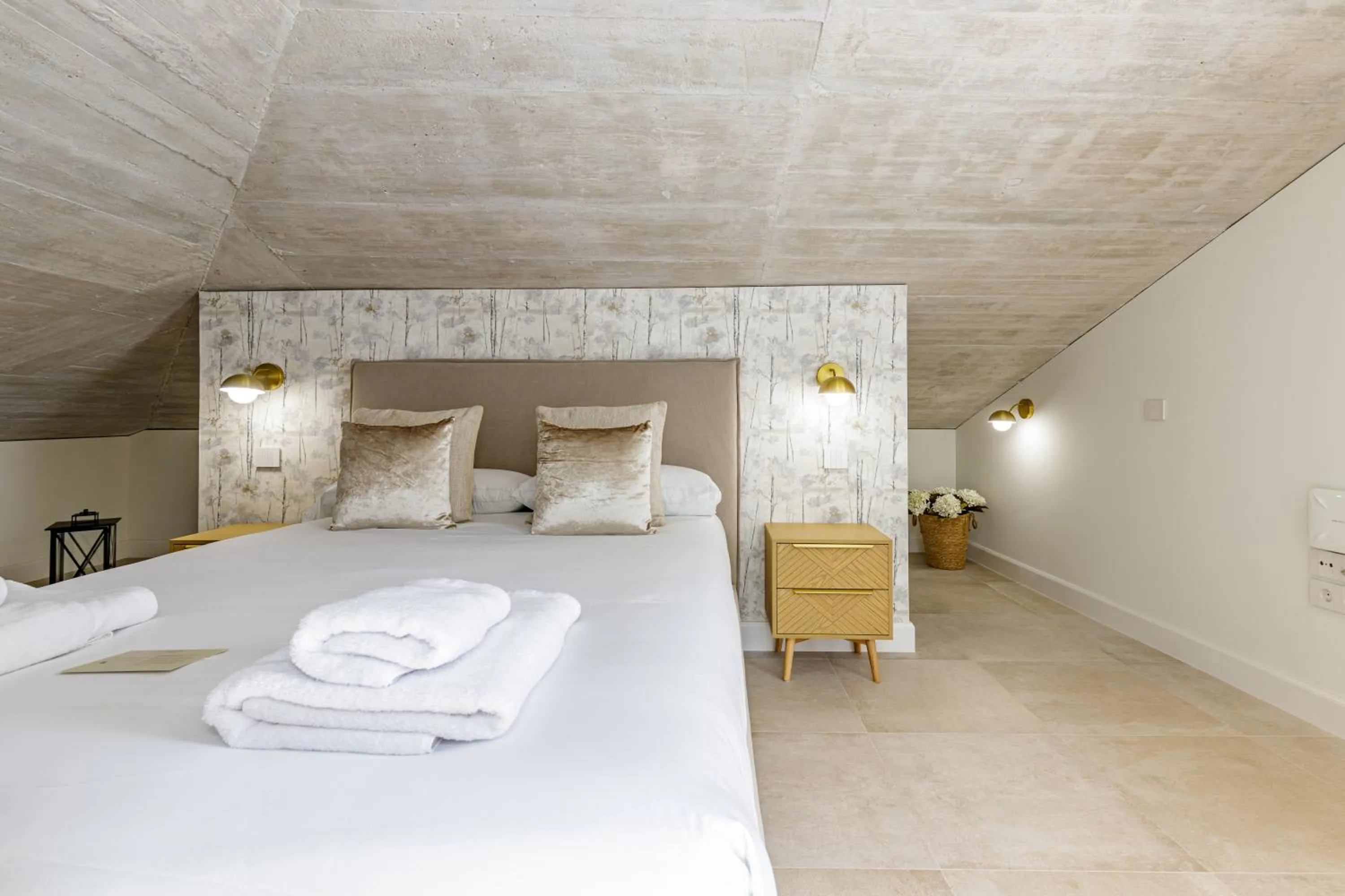 Bed in Plaza del Siglo Suites & Boutique Apartments by Caleta Homes