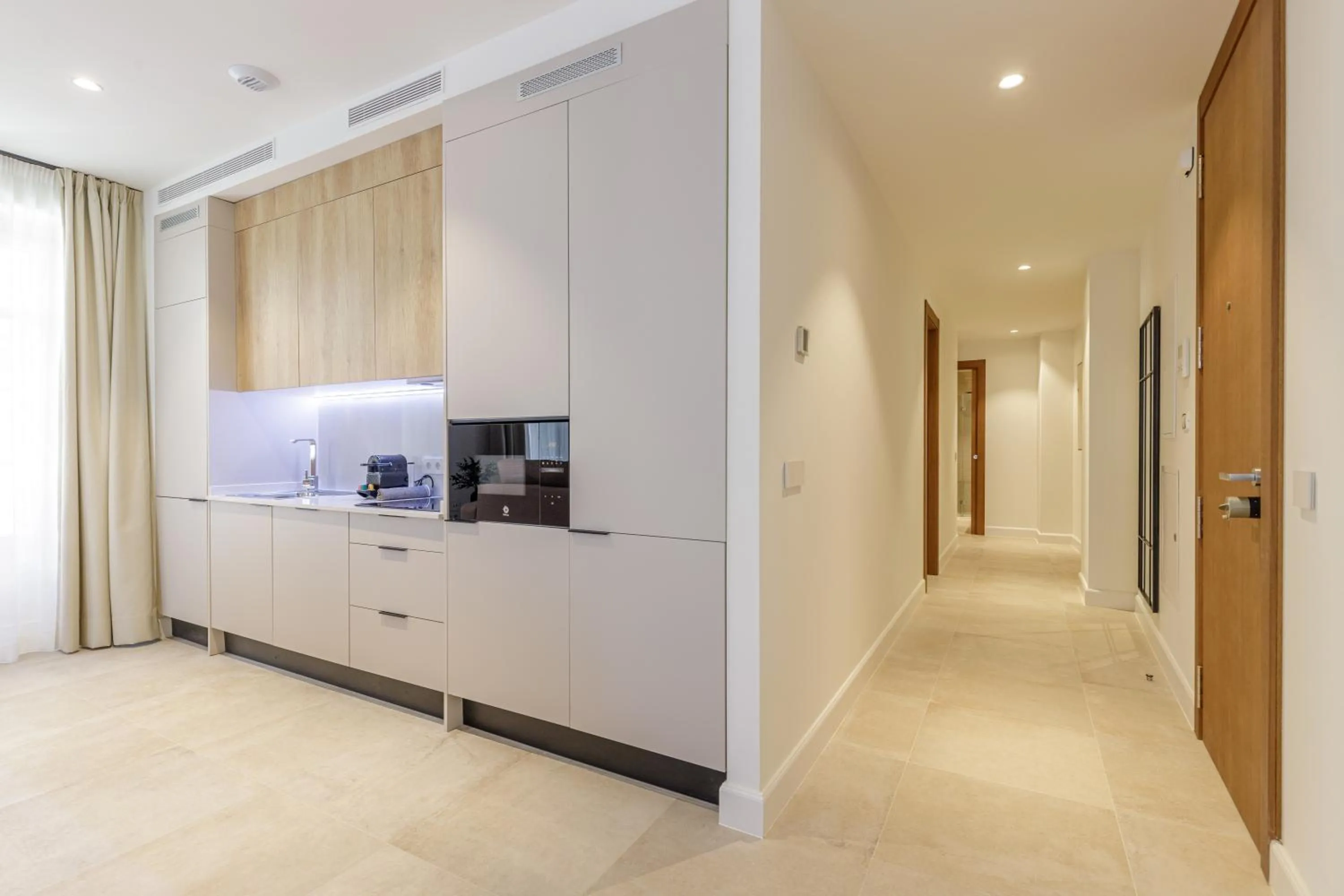 Kitchen or kitchenette in Plaza del Siglo Suites & Boutique Apartments by Caleta Homes