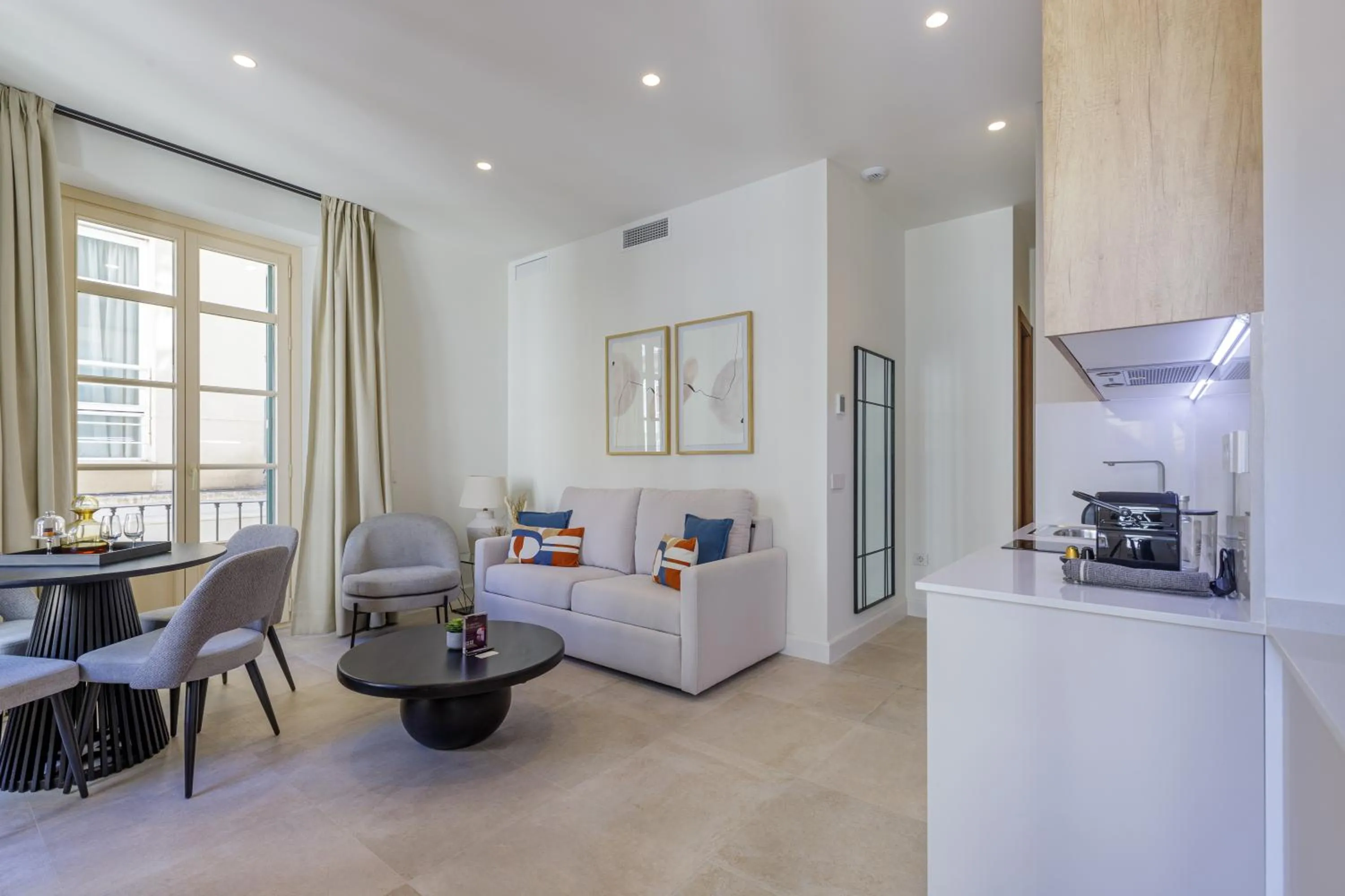 Kitchen or kitchenette in Plaza del Siglo Suites & Boutique Apartments by Caleta Homes