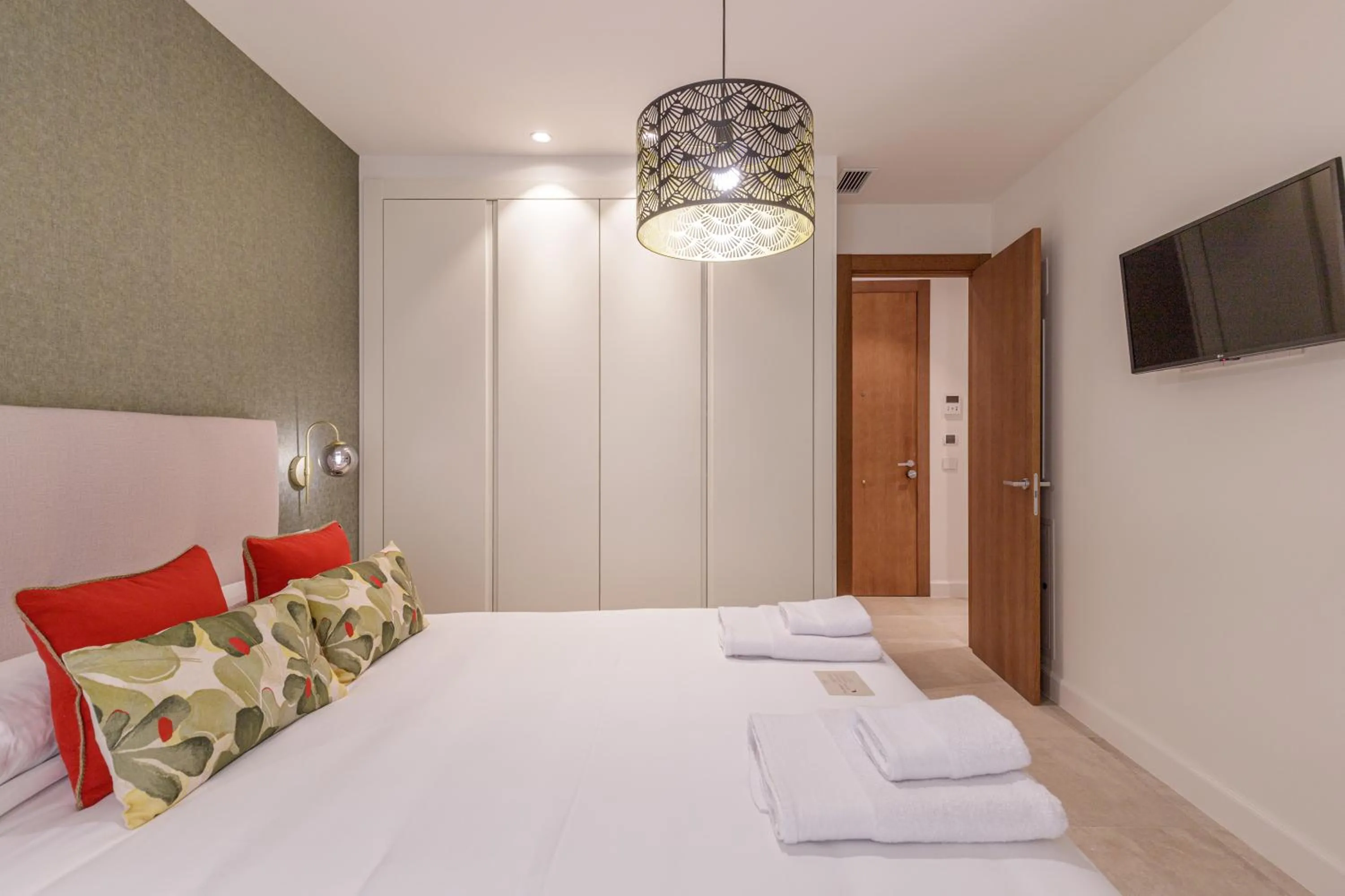 Bed in Plaza del Siglo Suites & Boutique Apartments by Caleta Homes