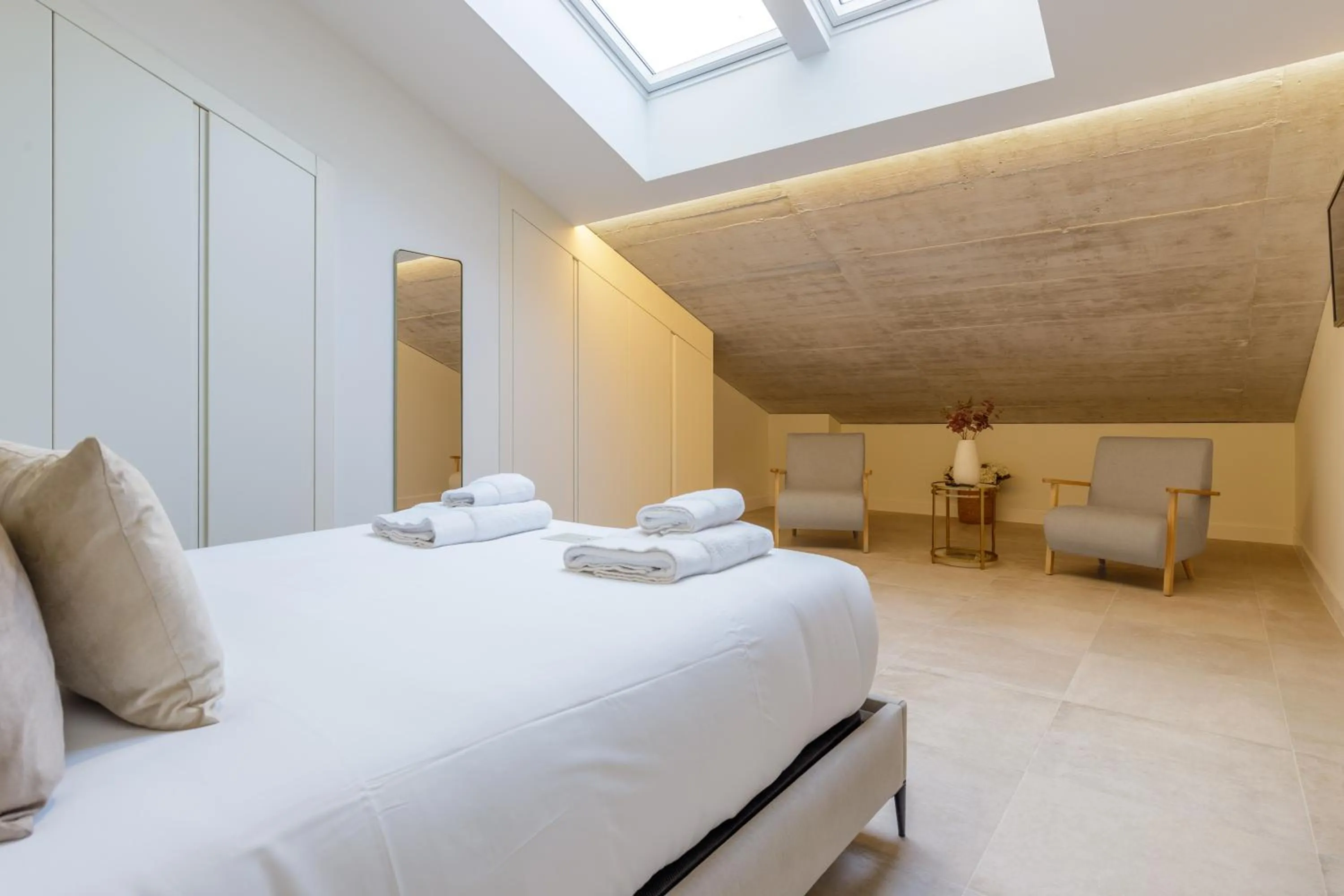 Bed in Plaza del Siglo Suites & Boutique Apartments by Caleta Homes