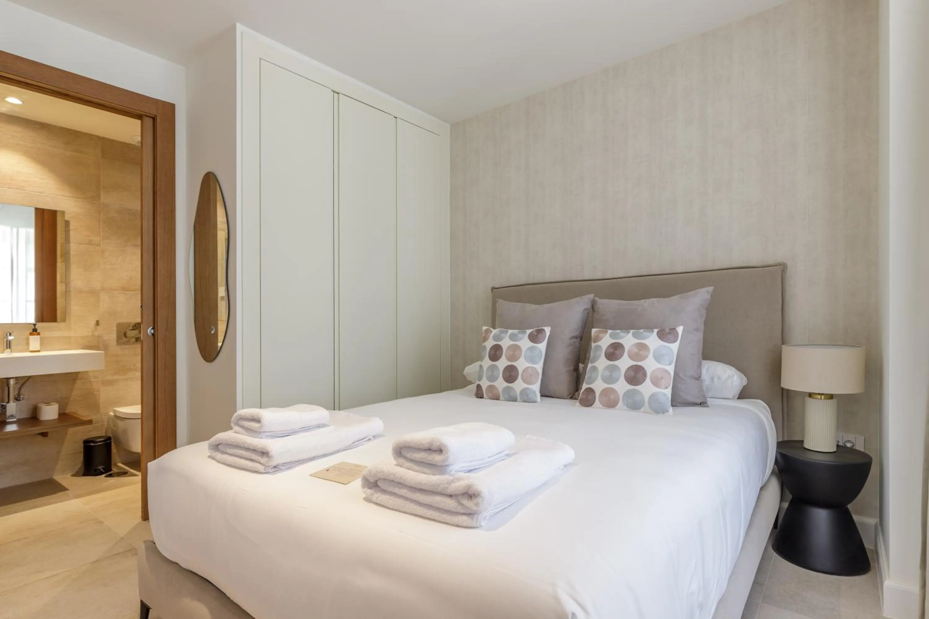 Bed in Plaza del Siglo Suites & Boutique Apartments by Caleta Homes