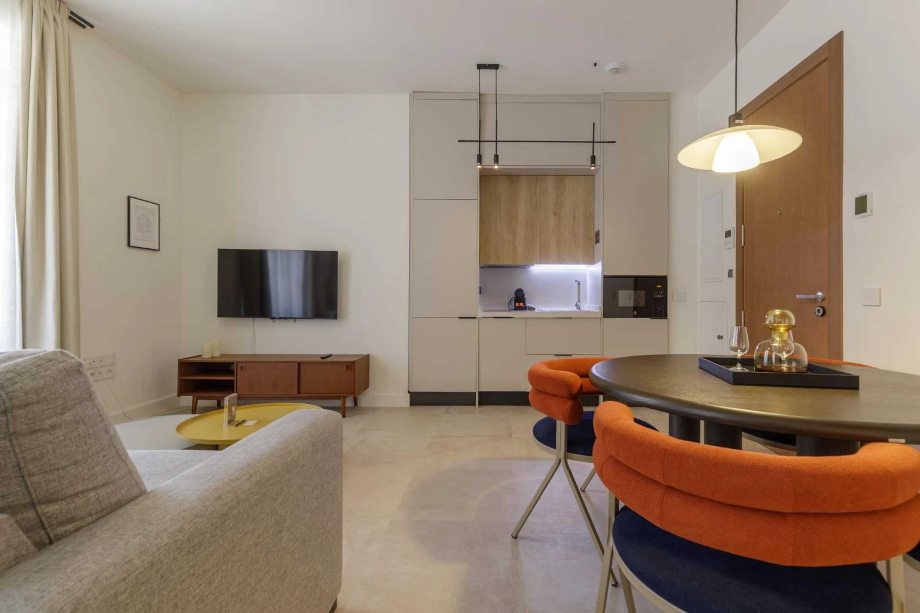 Communal lounge/ TV room in Plaza del Siglo Suites & Boutique Apartments by Caleta Homes