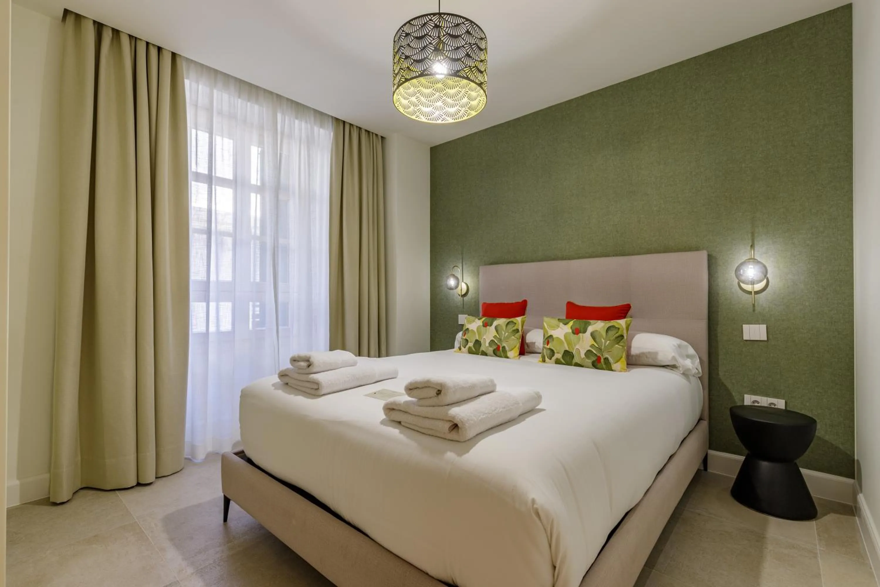 Bed in Plaza del Siglo Suites & Boutique Apartments by Caleta Homes