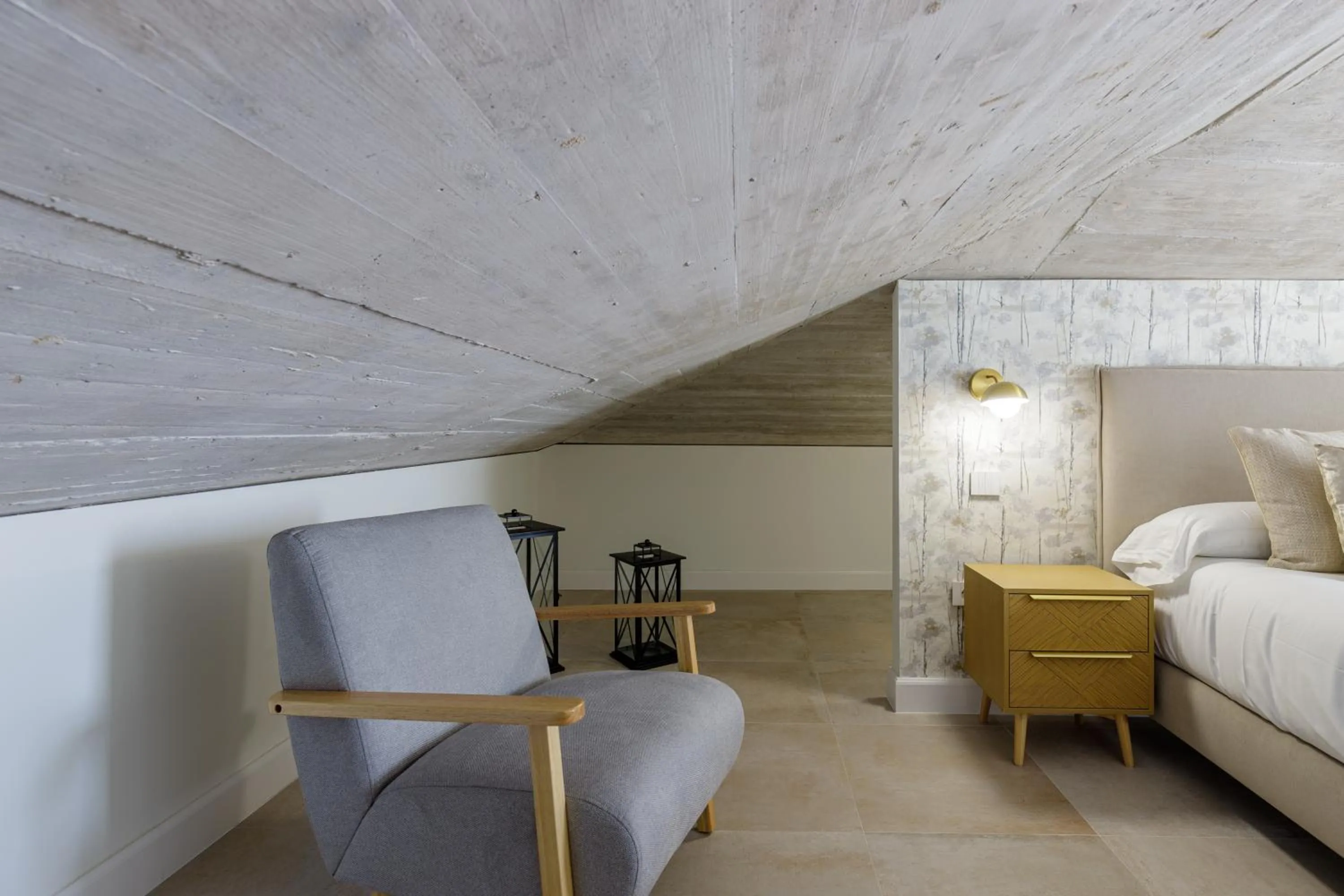 Bed in Plaza del Siglo Suites & Boutique Apartments by Caleta Homes