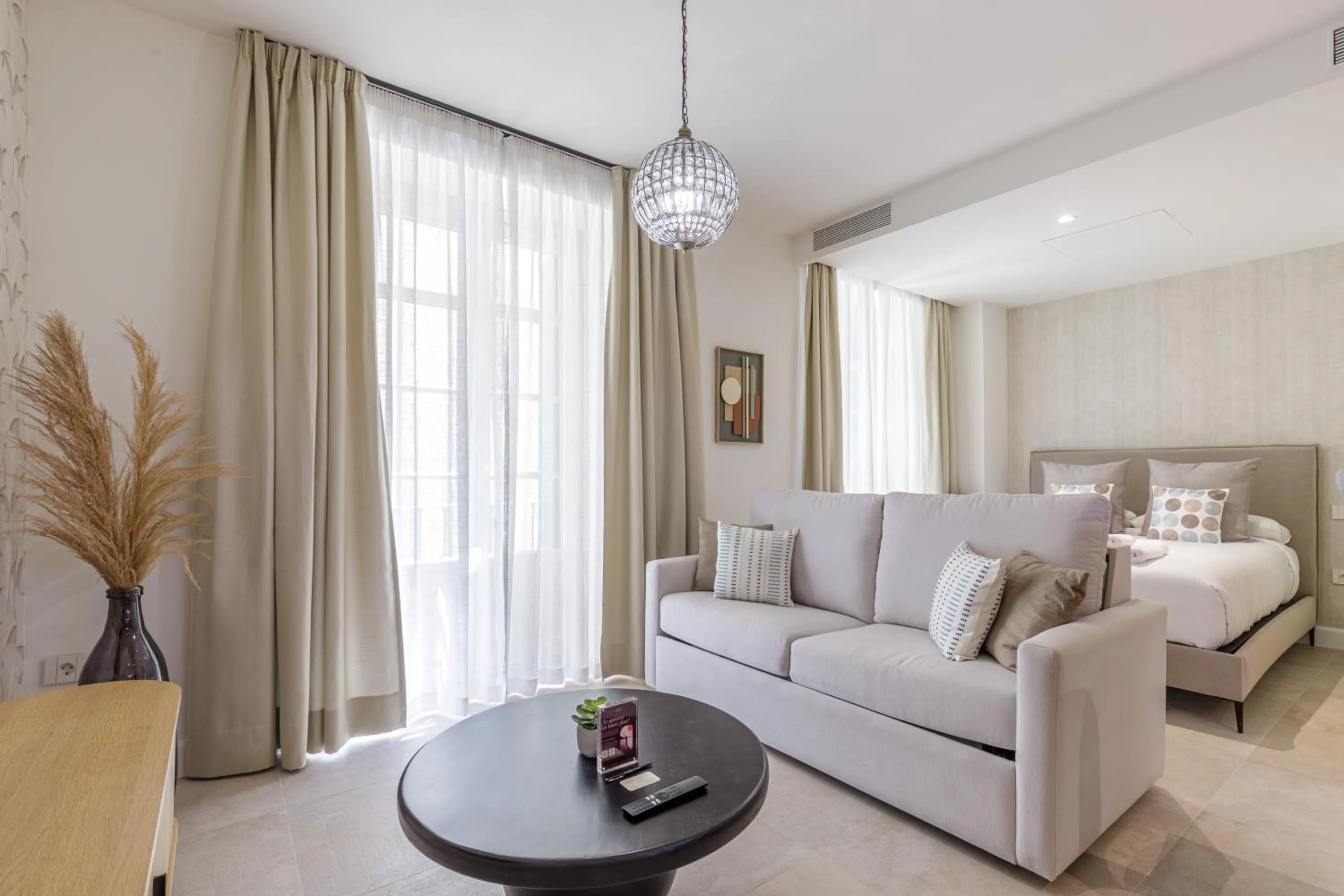Bed in Plaza del Siglo Suites & Boutique Apartments by Caleta Homes