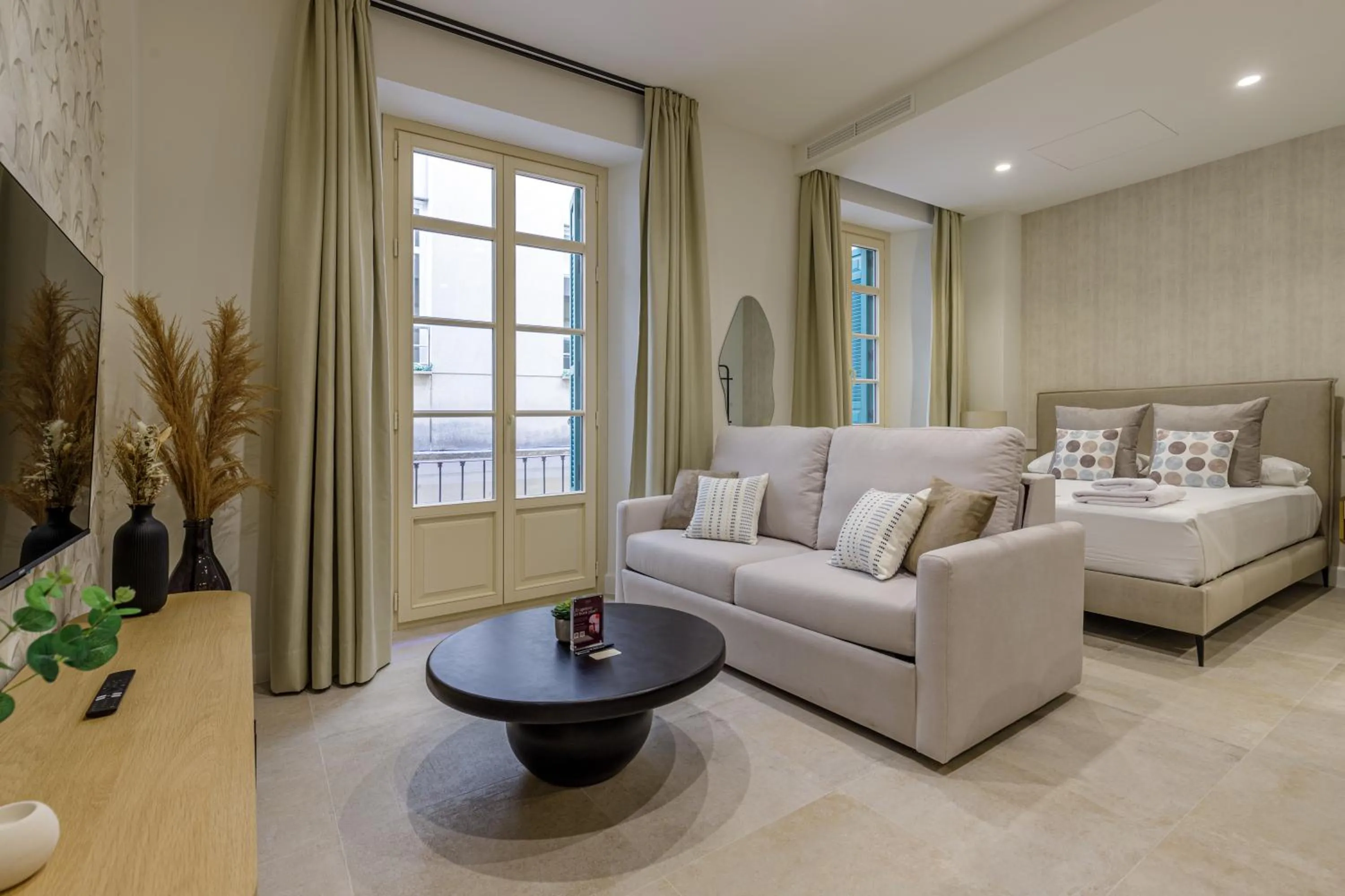 Bed in Plaza del Siglo Suites & Boutique Apartments by Caleta Homes