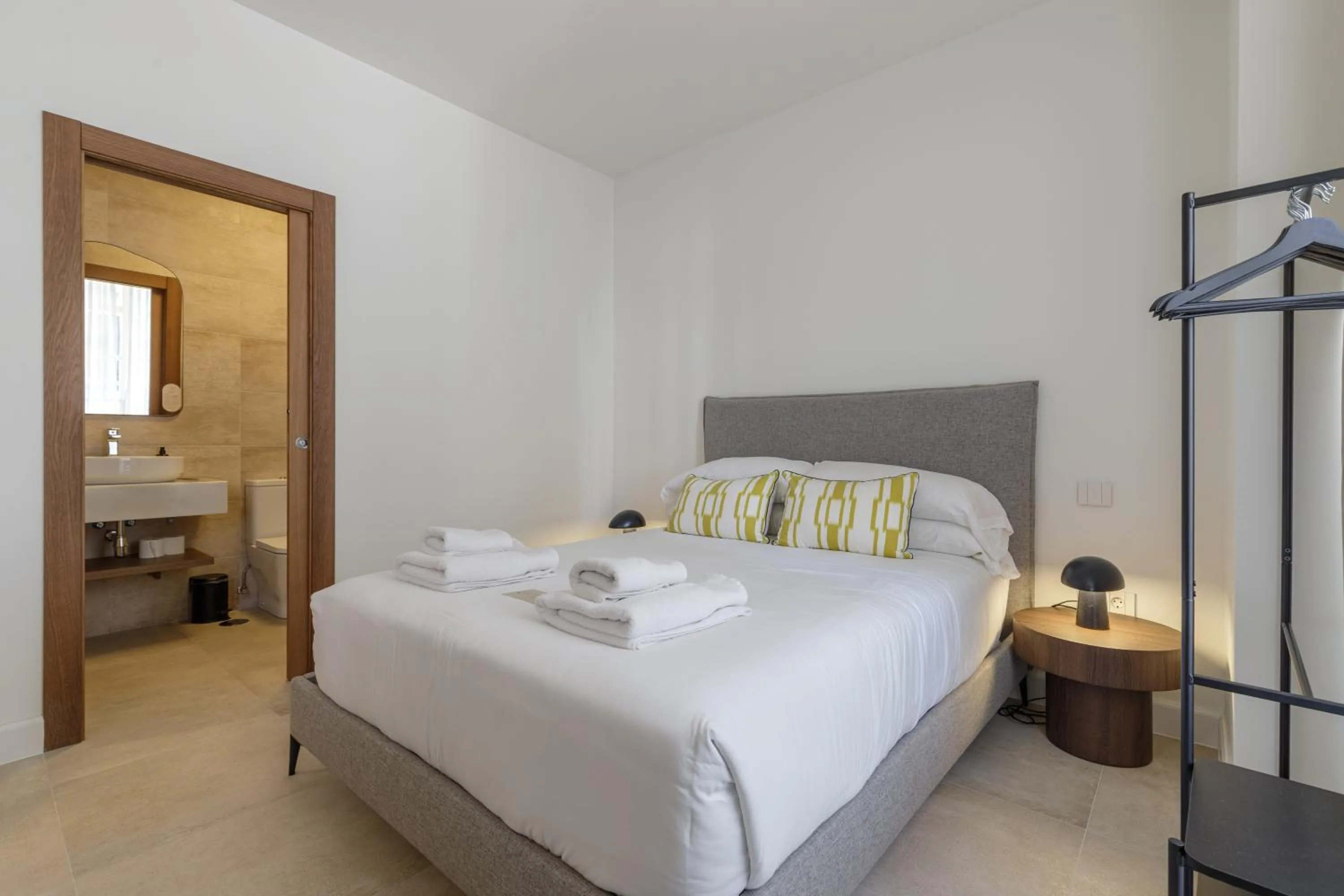 Bed in Plaza del Siglo Suites & Boutique Apartments by Caleta Homes