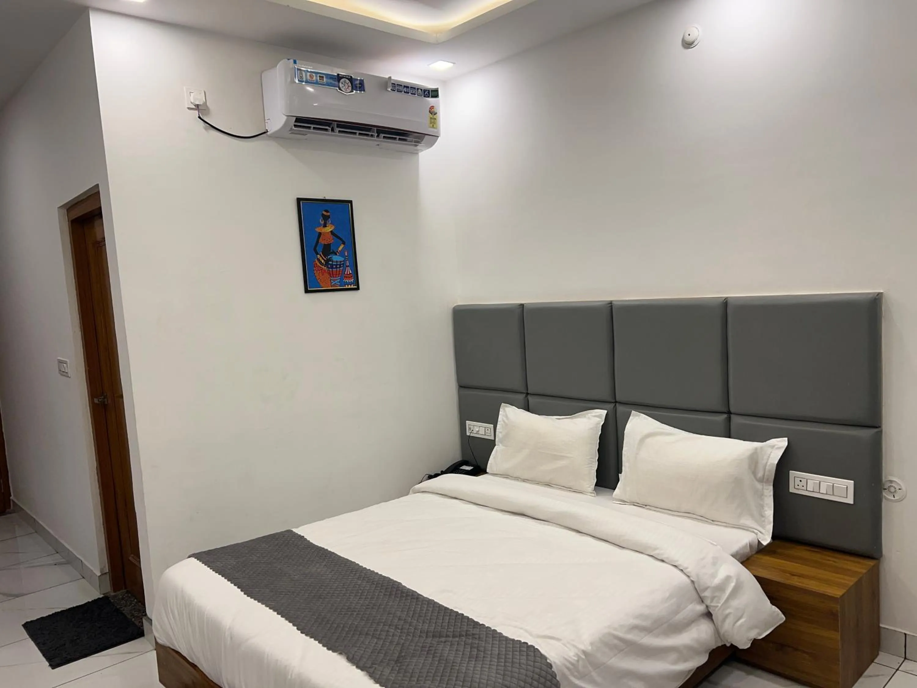 Bed in The Shalam Resort श्रीकृष्ण शरणं मम