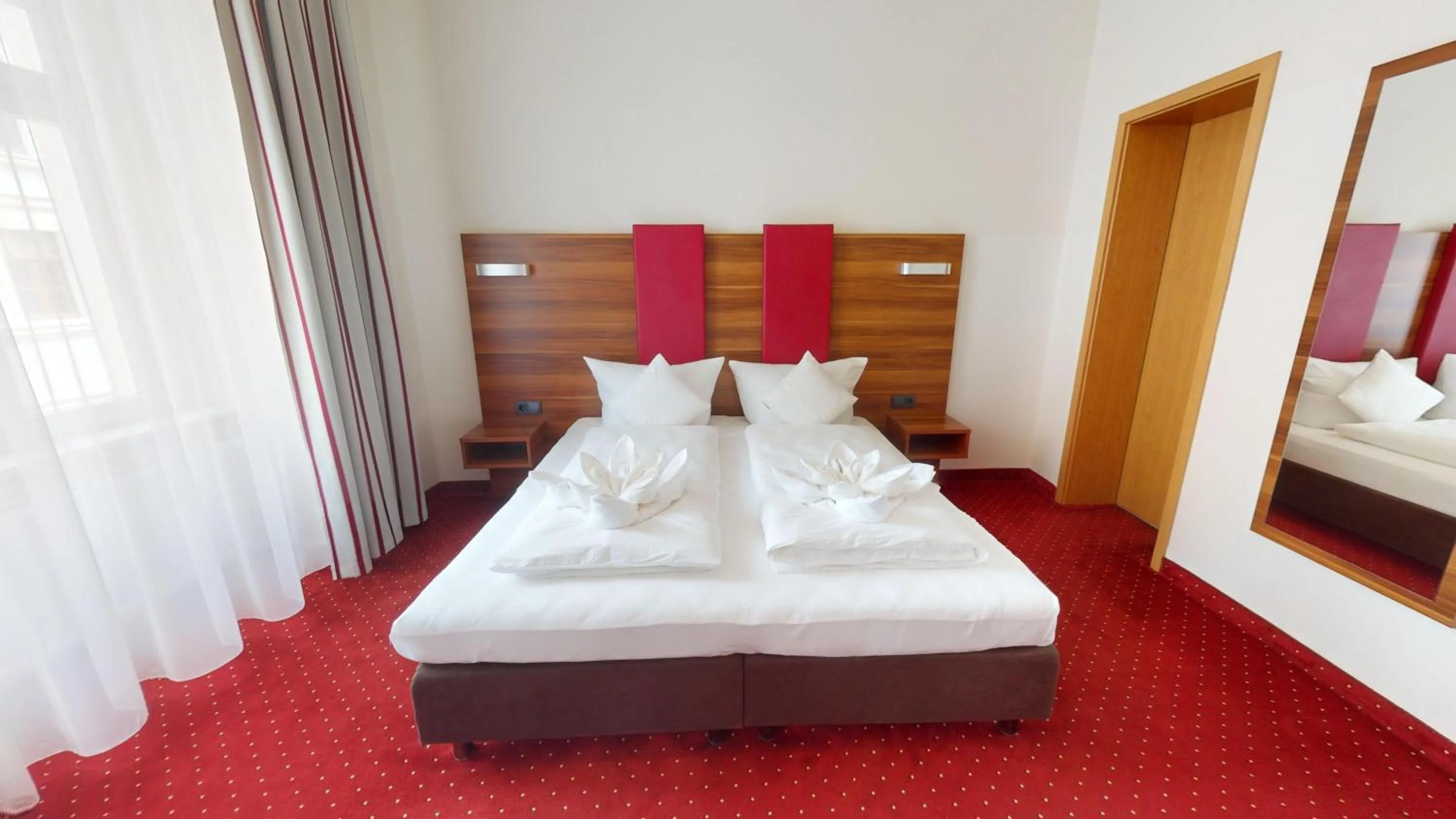 Bed in Hotel Schwibbogen Altstadt & Apartments