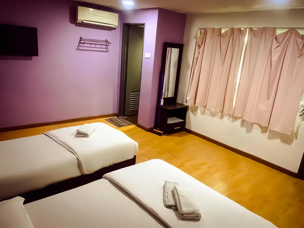 Bed in TM Hotel Bed in TM Hotel