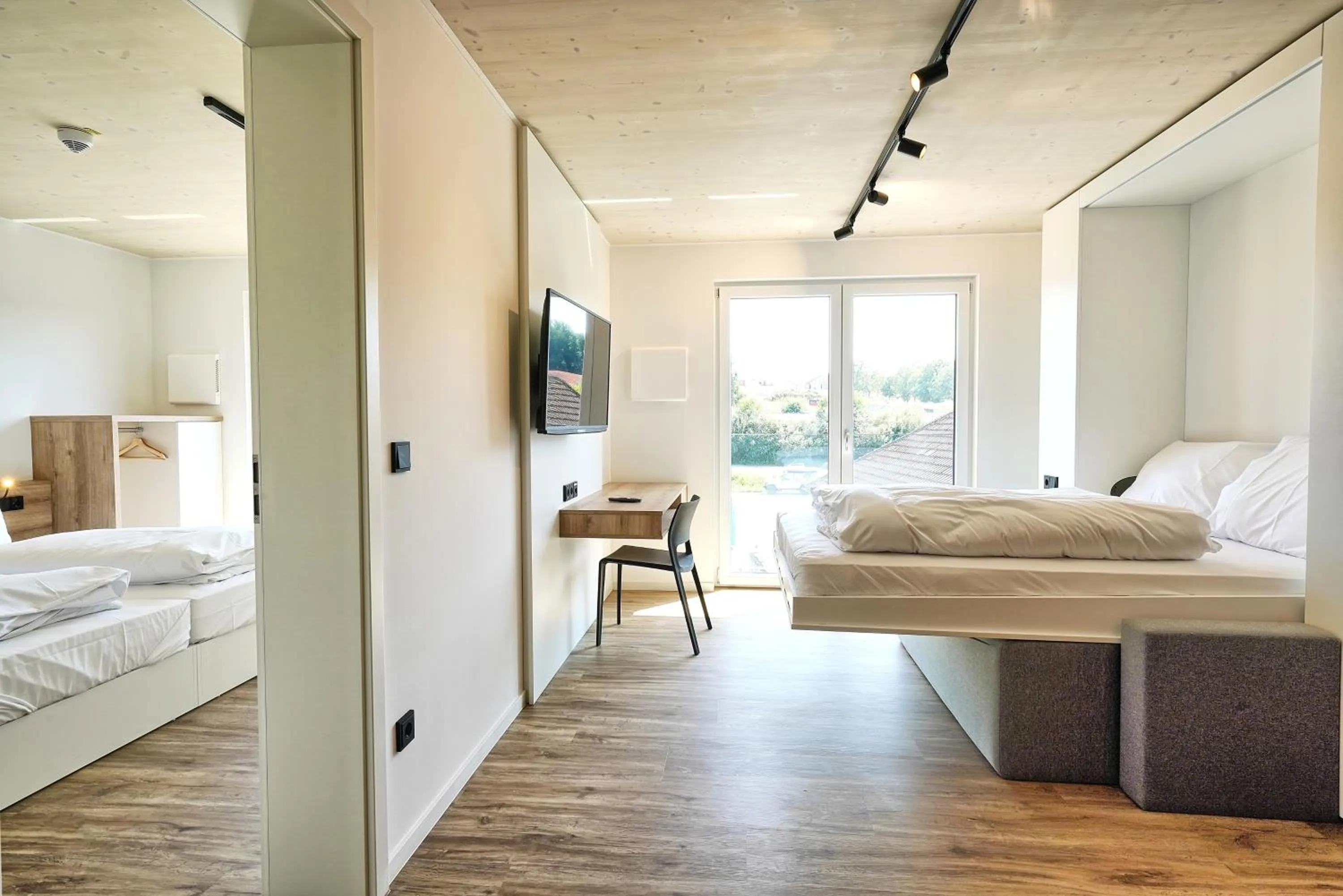 Photo of the whole room, Bed in Timber One Boardinghouse Dorfen