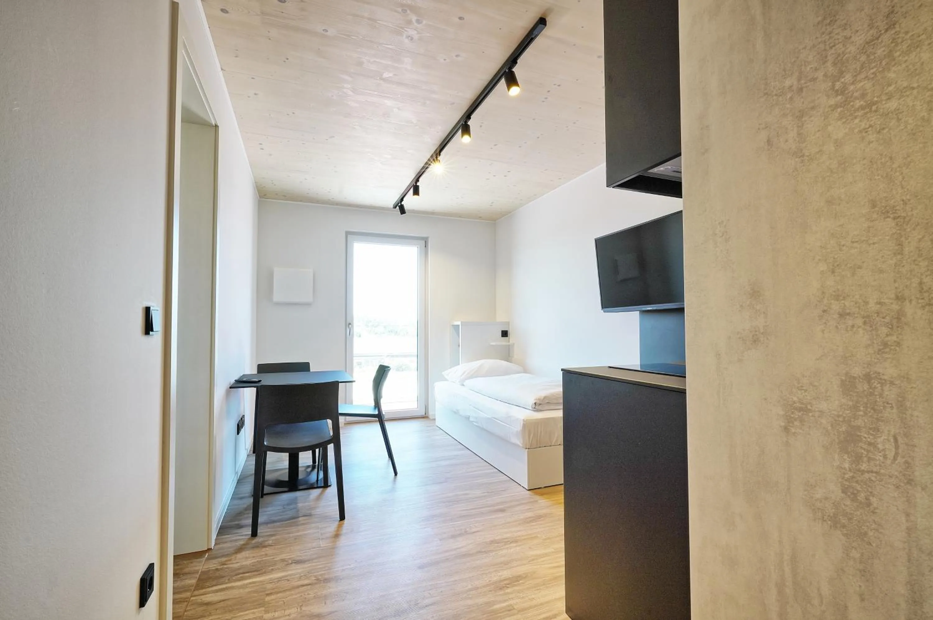 Photo of the whole room in Timber One Boardinghouse Dorfen