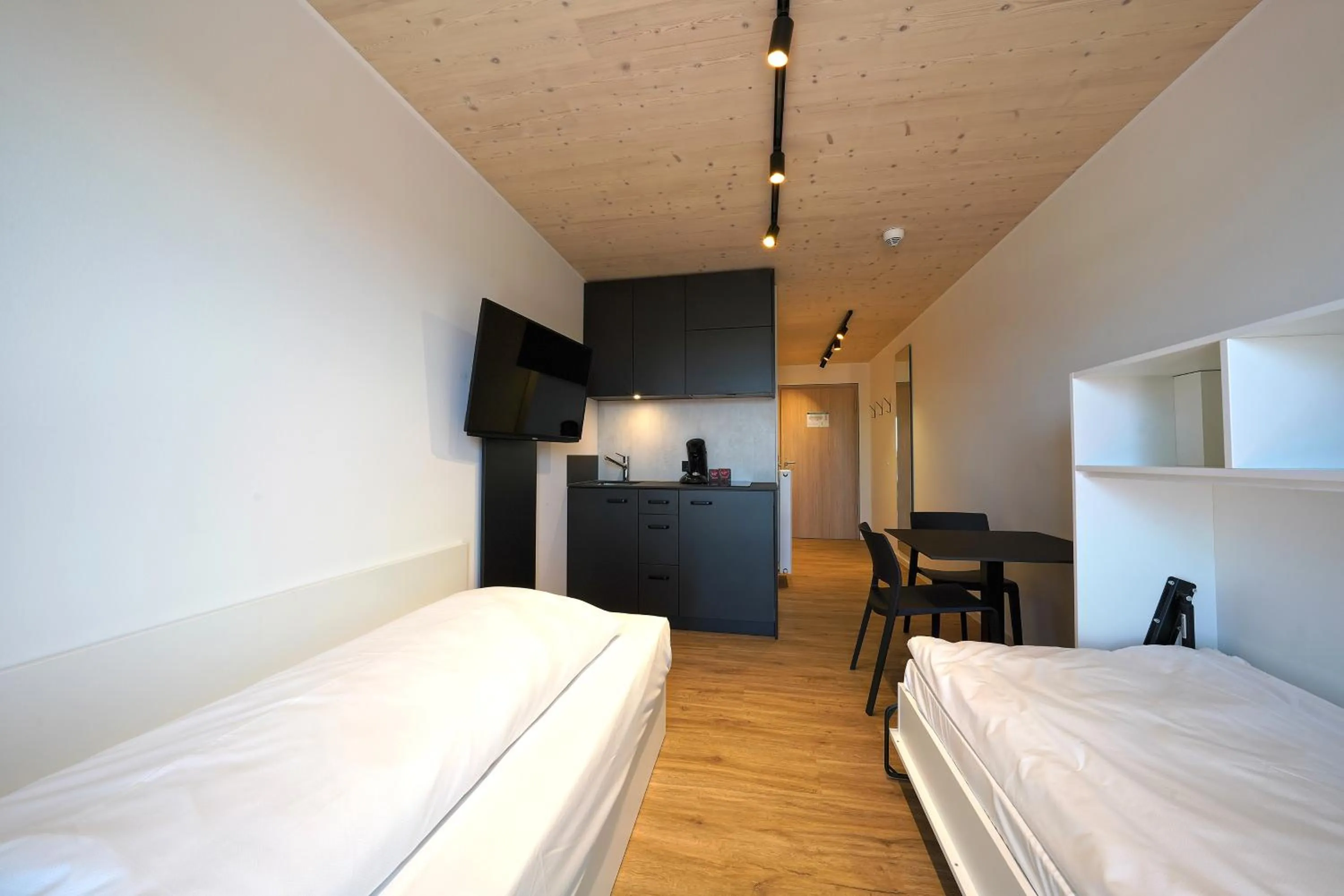 Photo of the whole room, Bed in Timber One Boardinghouse Dorfen