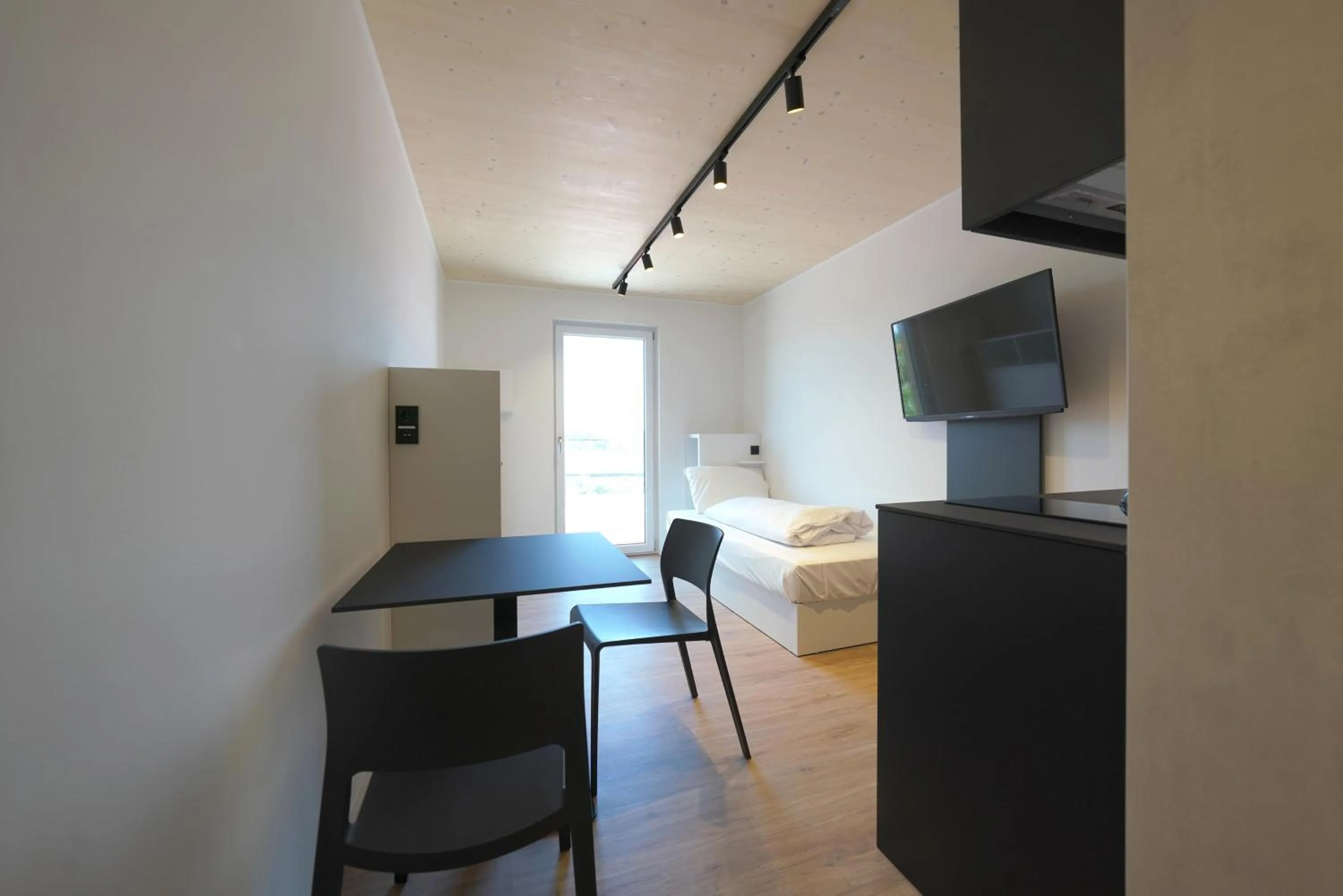 Photo of the whole room in Timber One Boardinghouse Dorfen