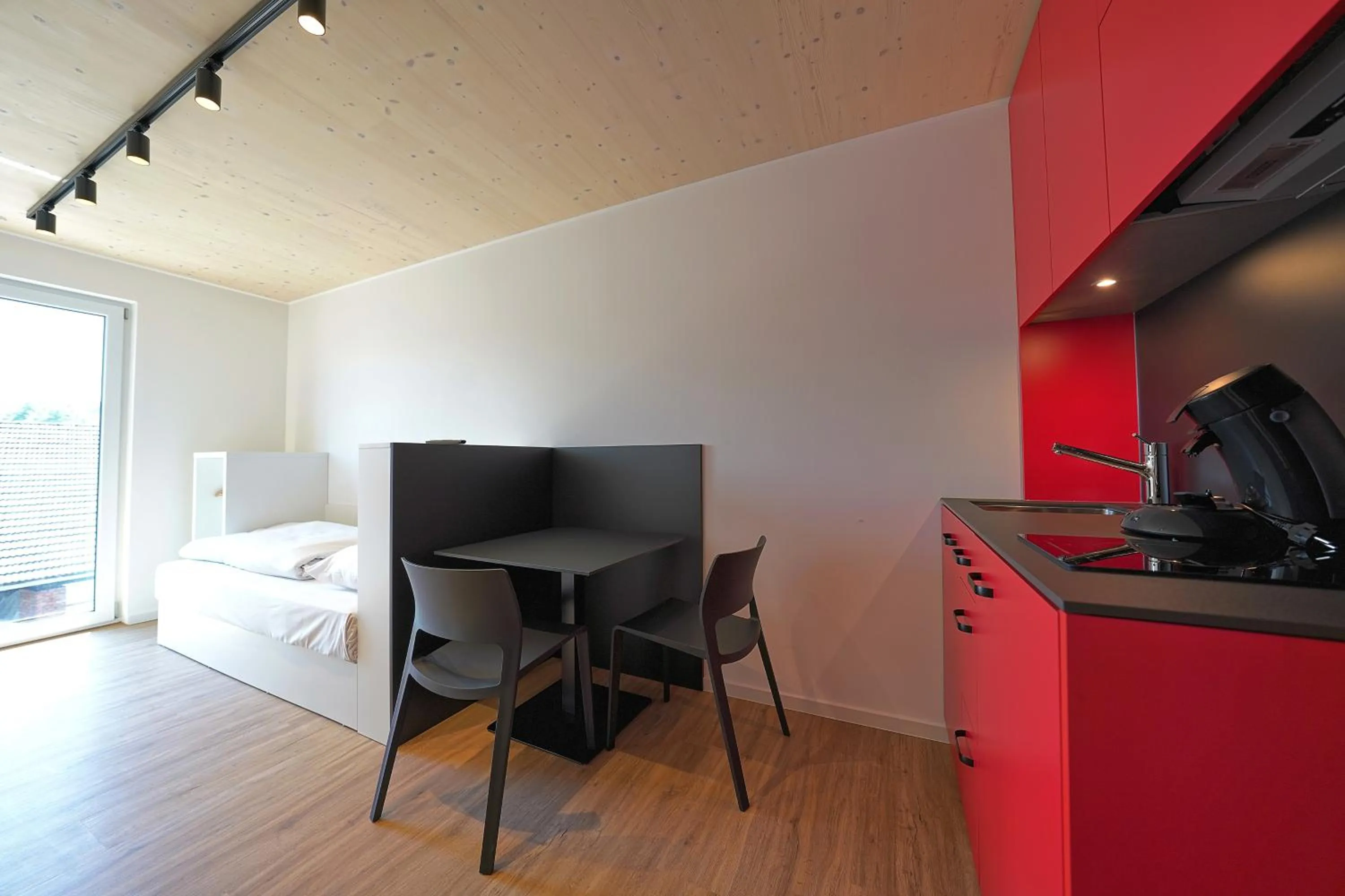 Photo of the whole room, Bed in Timber One Boardinghouse Dorfen