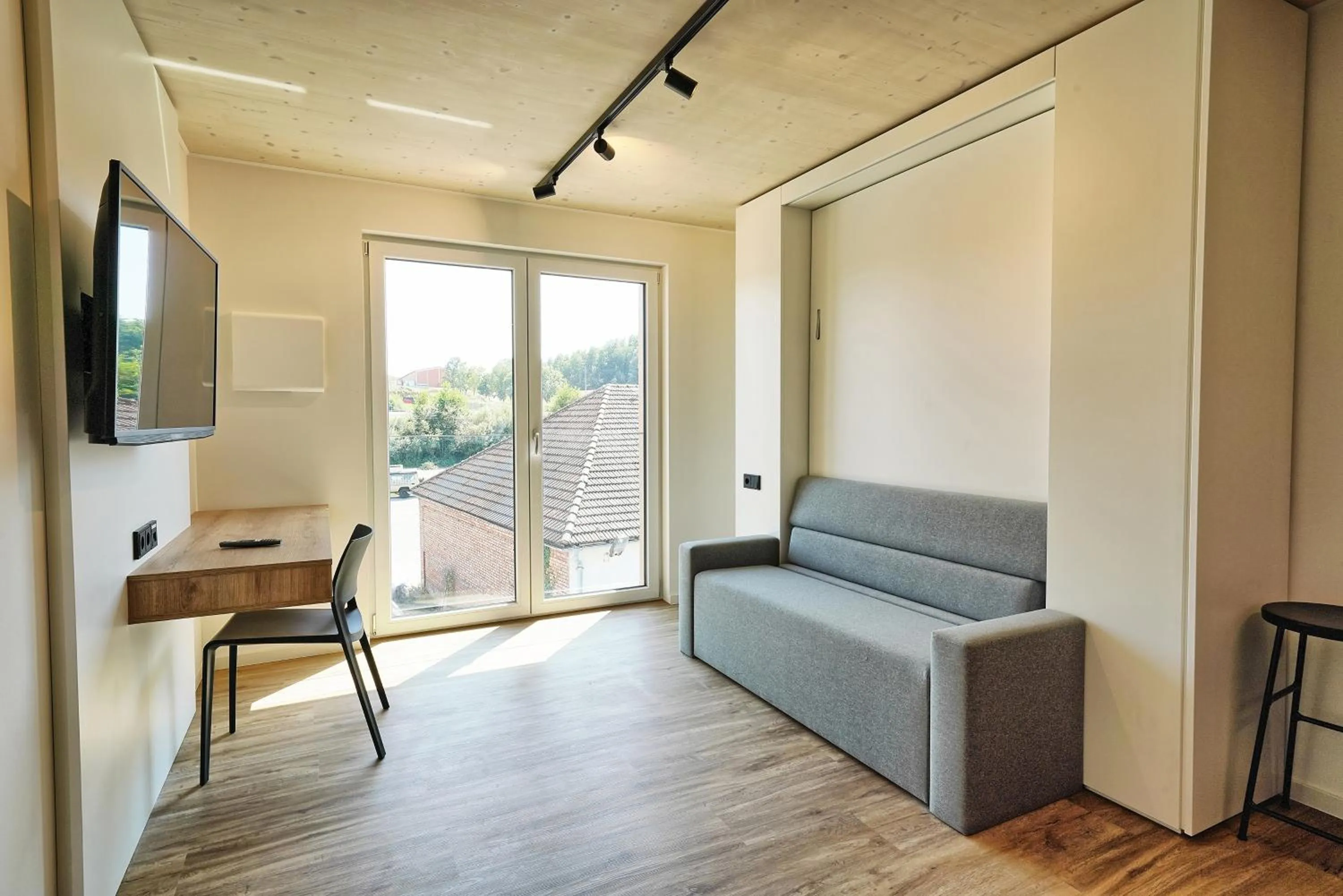 Seating area in Timber One Boardinghouse Dorfen