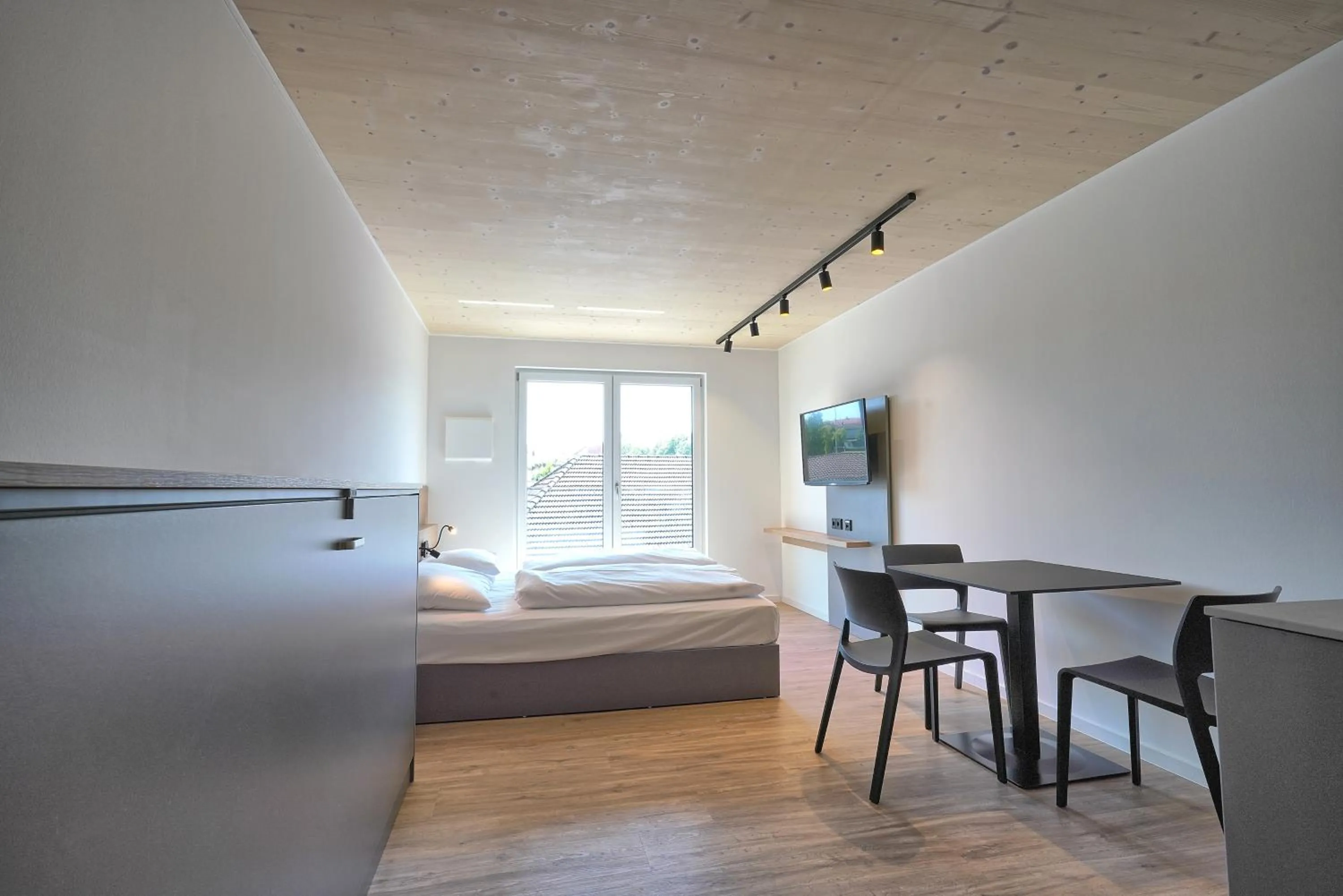 Photo of the whole room, Bed in Timber One Boardinghouse Dorfen