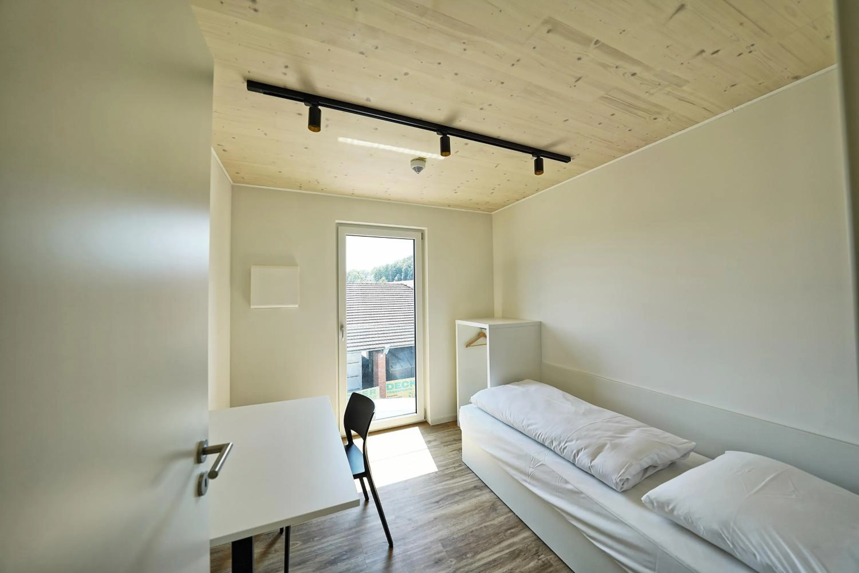 Photo of the whole room, Bed in Timber One Boardinghouse Dorfen