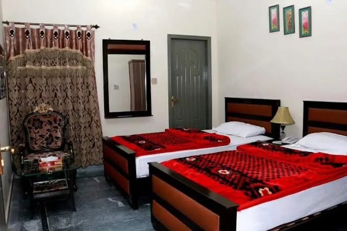 Bed in Hotel Executive Inn