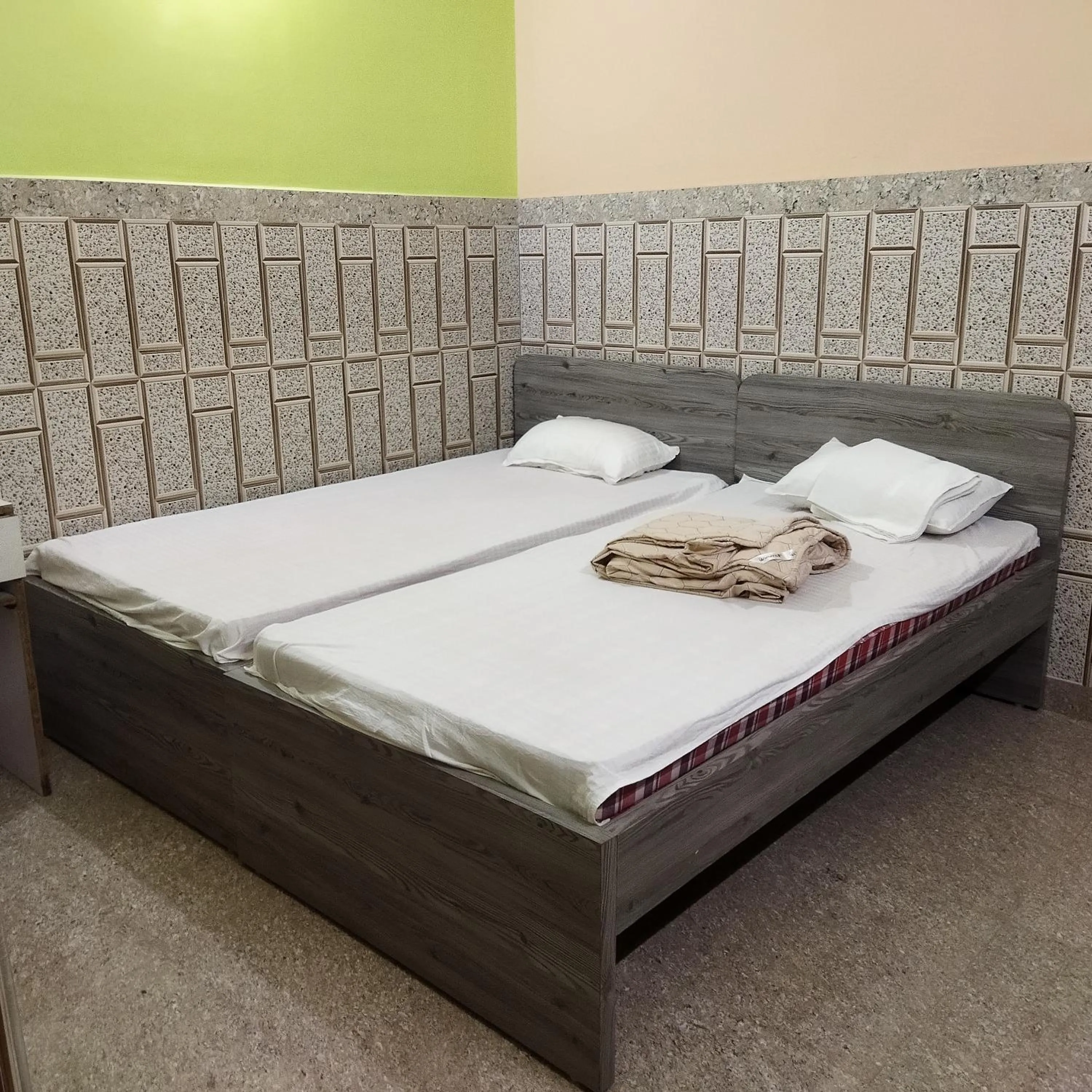 Bed in Hotel Bhagwat Palace