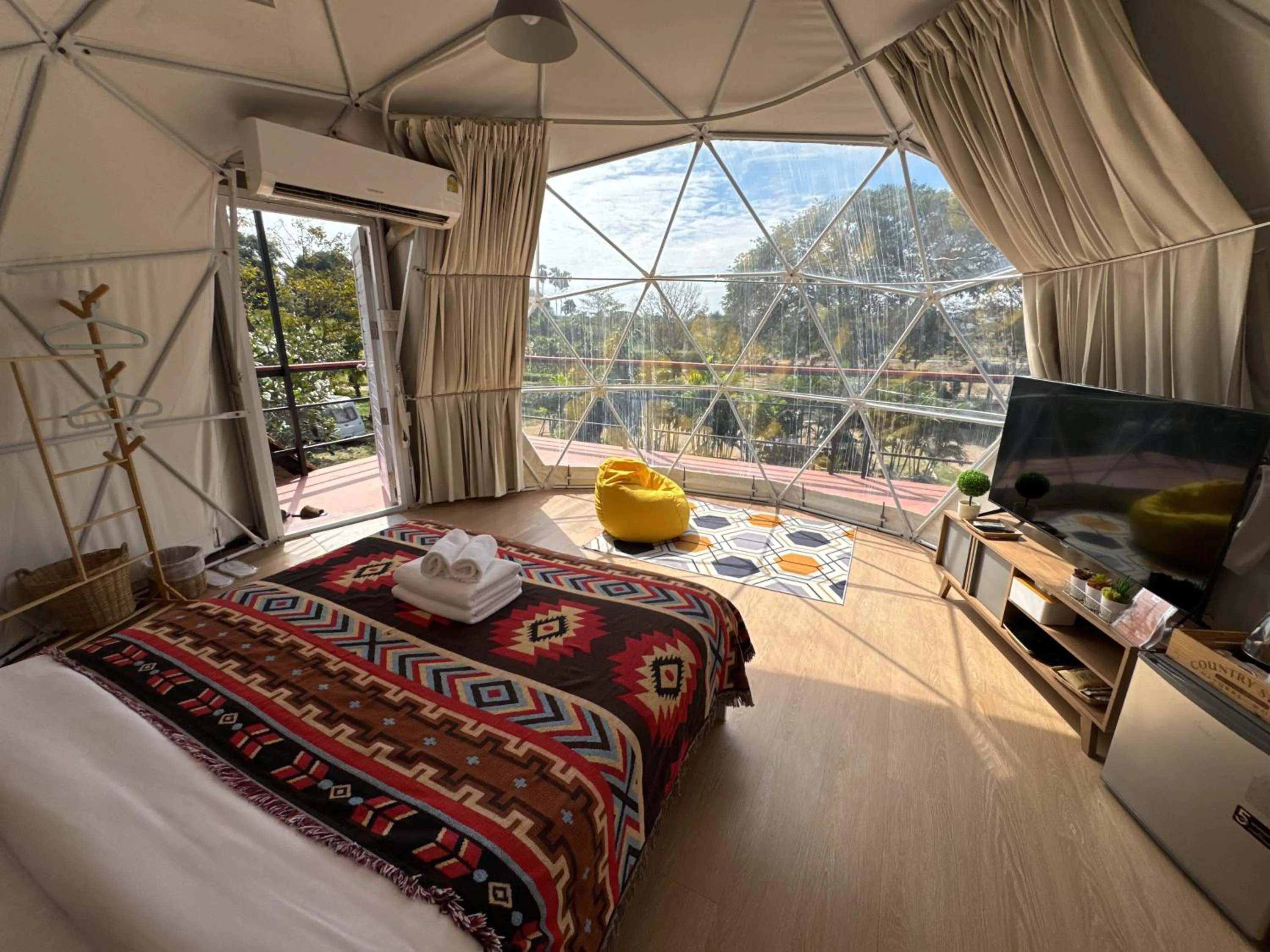 Bed in The Campster Kanchanaburi